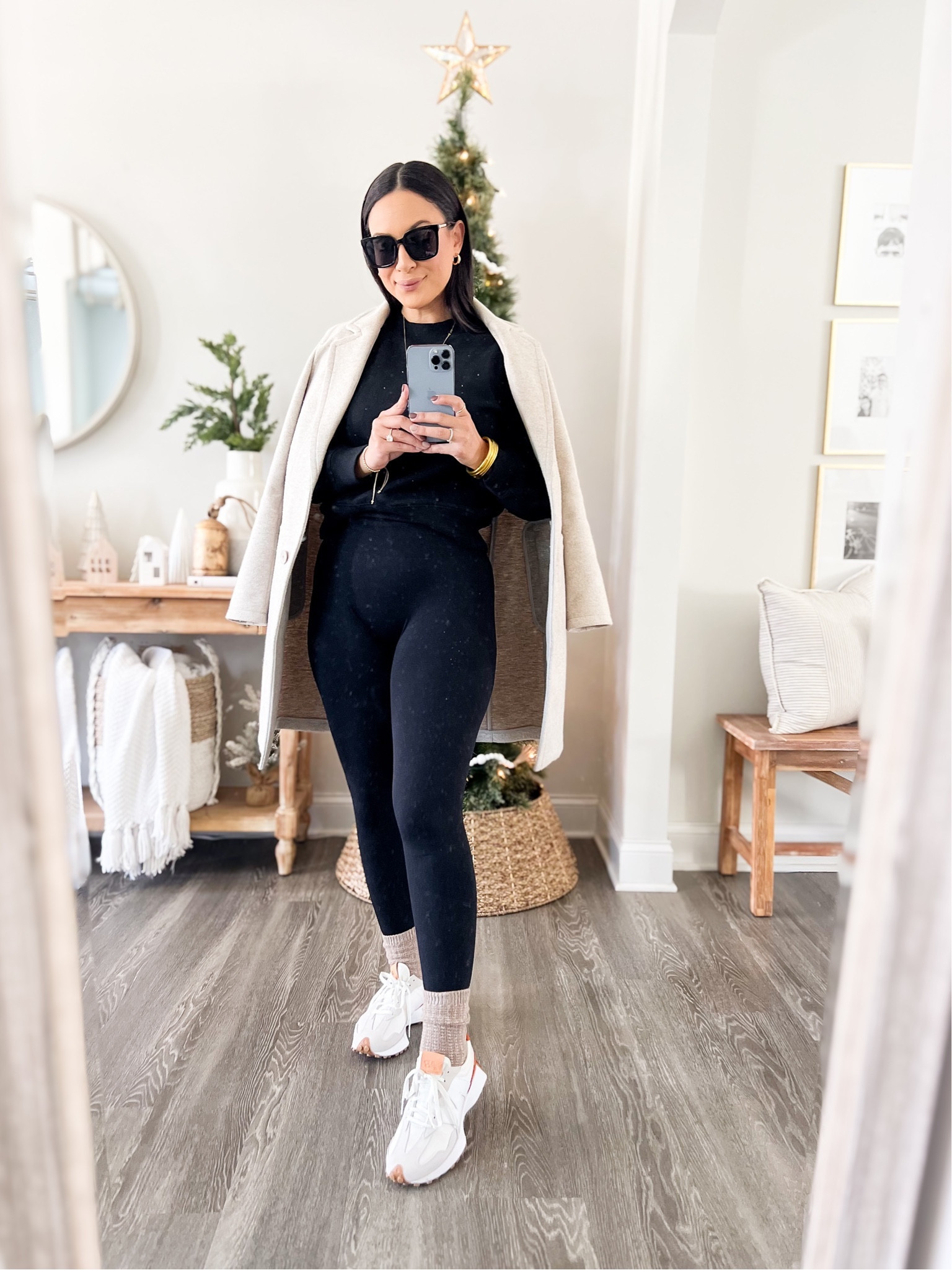 Black and White outfit. Leggings outfit. Black leggings paired with black jewelry crewneck sweater and new balance 327 women’s sneakers. Express coats now 50% off. Neutral outfit. Sporty Chic Style. 

#LTKSeasonal #LTKsalealert #LTKmidsize