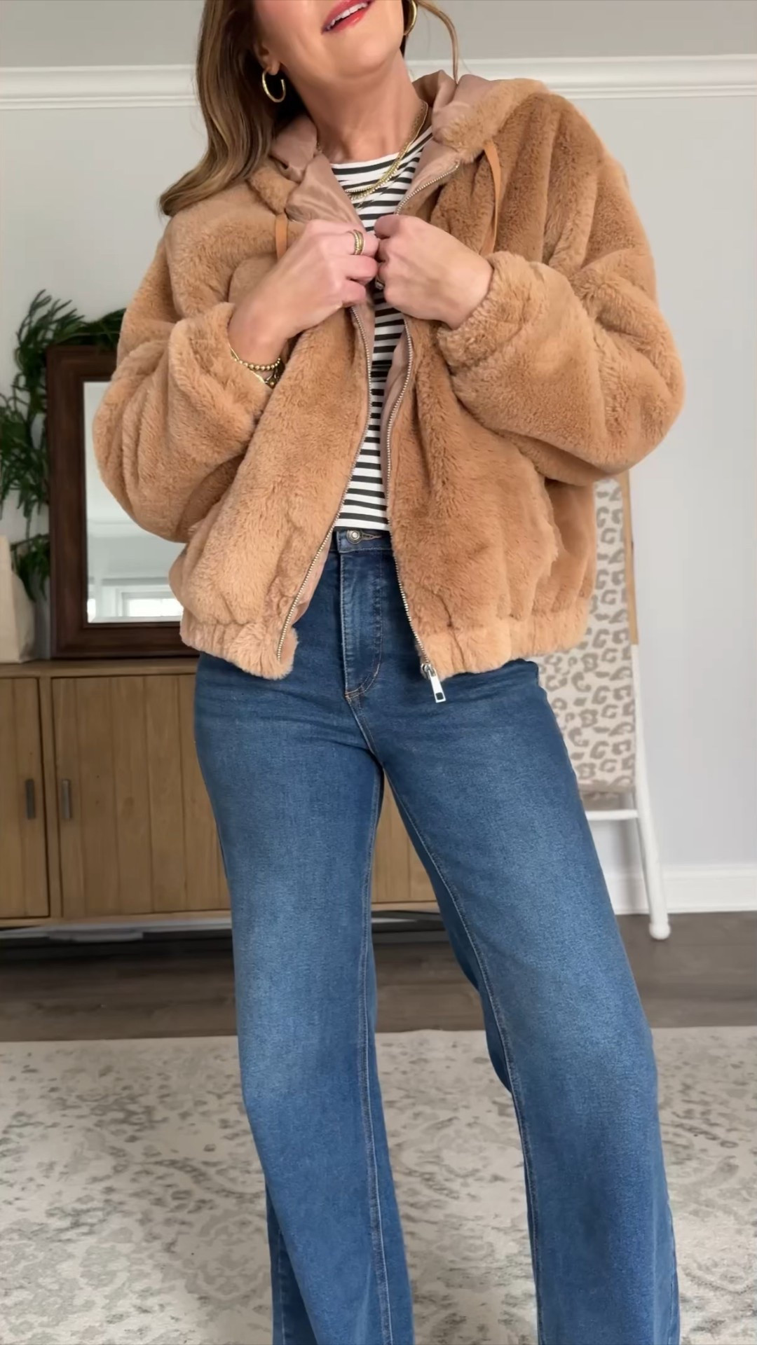 These $25 jeans are so comfortable and the most flattering pair of jeans in my closet. They’re the perfect wide leg/flare silhouette that give you legs for days and are so flattering in the booty. Plus their size inclusive. Styling them here with this very affordable faux fur jacket. It’s cute and cozy and a little more elevated than your puffer jacket but just as warm.

#LTKTall #LTKFindsUnder50 #LTKGiftGuide