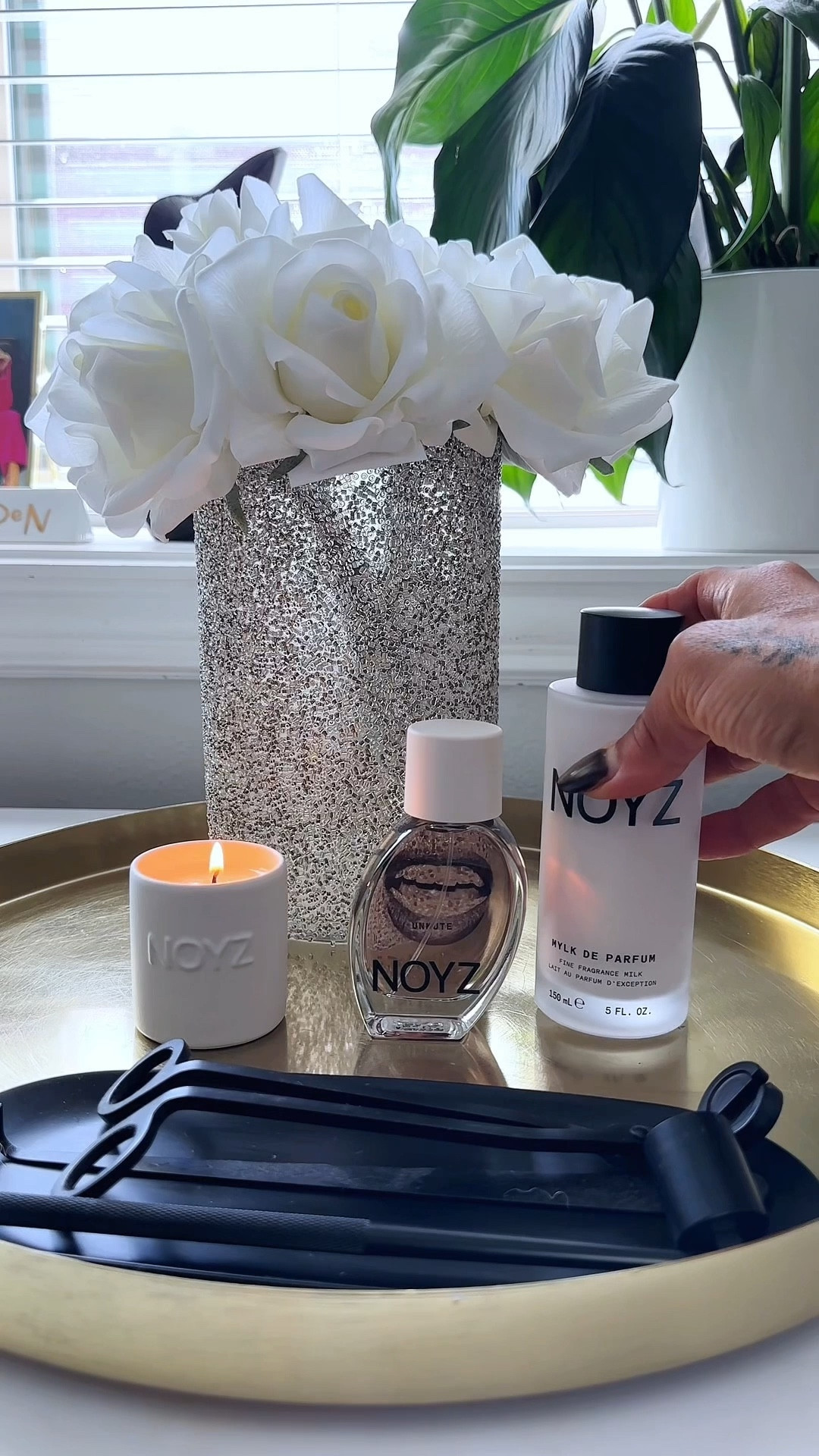 Noyz has introduced Mylk de Parfum and it is scintillating! It’s a pour on fine fragrance milk that projects the scent power of perfume. Infused with hyaluronic acid for nourished, soft, hydrated skin, it feels like liquid silk and leaves a luminous sheen. It’s alcohol free, fast absorbing, and delivers 12 hours of all day wear. 
Unmute is my favorite Noyz fragrance with sultry notes: 
Top: Indonesian Cassia, Black Plum, Clary Sage, Ceylon, Cinnamon, Pistachio 
Heart: Cashmere Woods, Spanish Ciste, Somalian Incense
Base: Madagascar Vanilla, Crisp Amber
