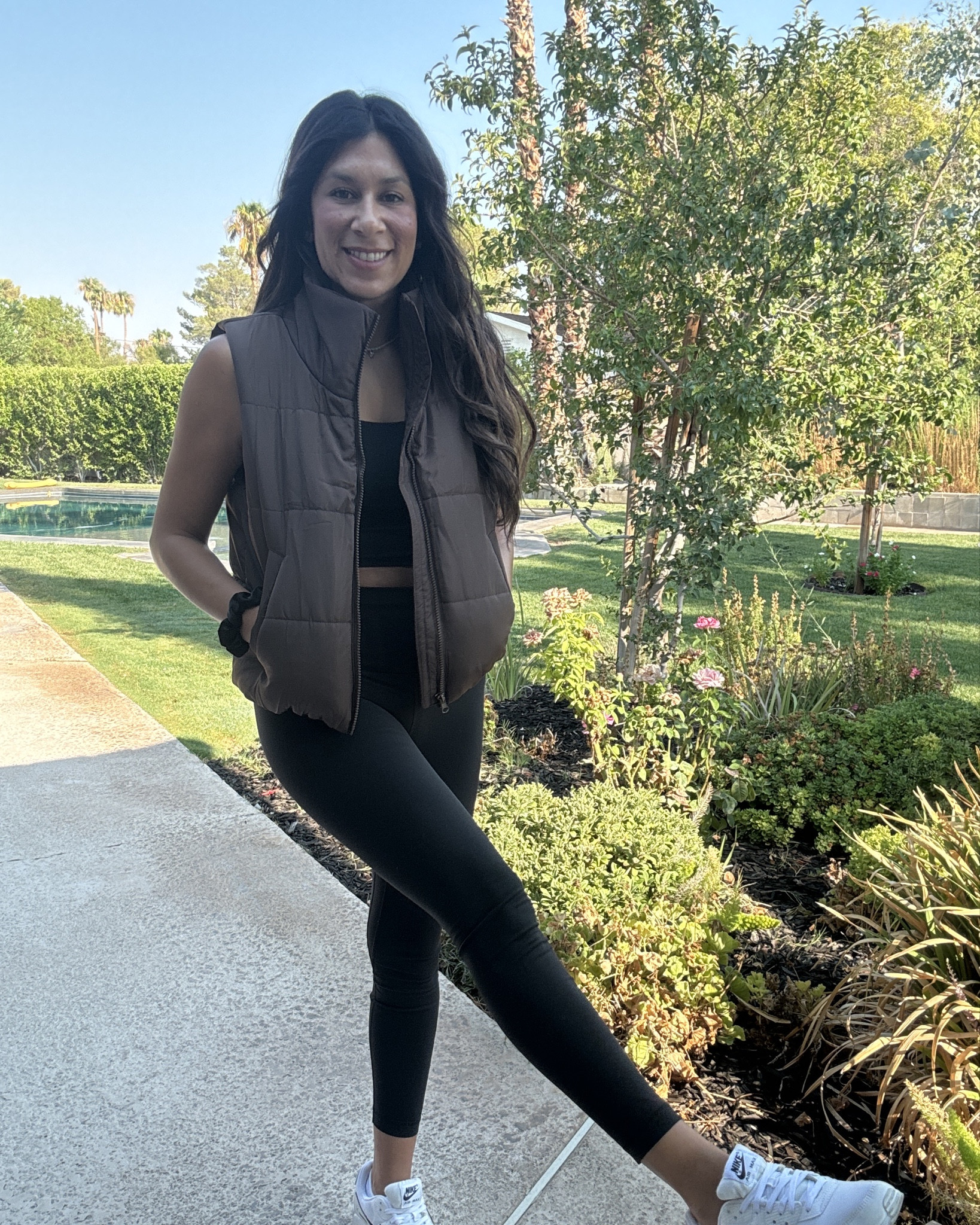 Keeping it sleek and trendy today. 🖤🟤  
Black leggings and a matching black top for that effortless vibe, topped off with this chic chocolate brown vest to elevate the look. 🤎 Paired it all with my fave white and black Nike Max kicks for that perfect sporty touch. Who else is loving this minimalist moment? #OOTD #SportyChic #MonochromeWithATwist #NikeMax #FitnessFashion

#LTKActive #LTKTravel #LTKFitness
