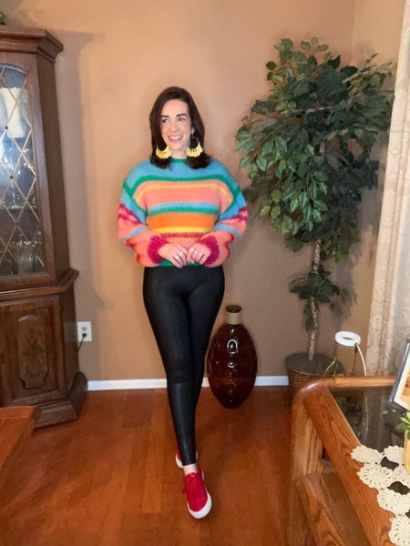 Spring Outfit - Striped sweater (size small). Black faux leather leggings (size small). Red sneakers (size 8.5). #sweater #colorfulsweater #leggings #blackleggings #fauxleatherleggings #redsneakers #sneakers #springoutfit 

#LTKfindsunder100 #LTKstyletip #LTKSeasonal