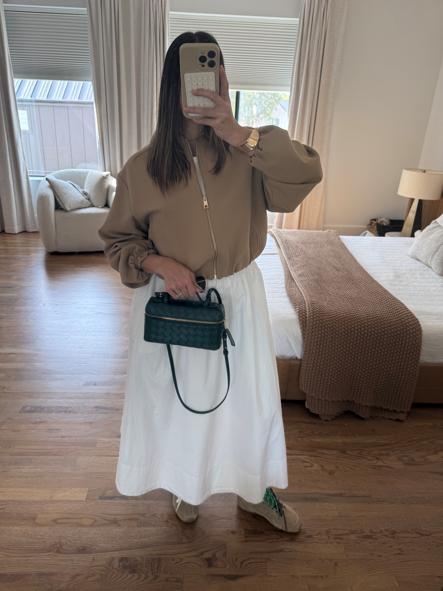 Casual OOTD 
White skirt runs big (size small) 
Zipper jacket from Zara (linked exact one and same with tank top I’m wearing underneath 

#LTKSeasonal #LTKStyleTip