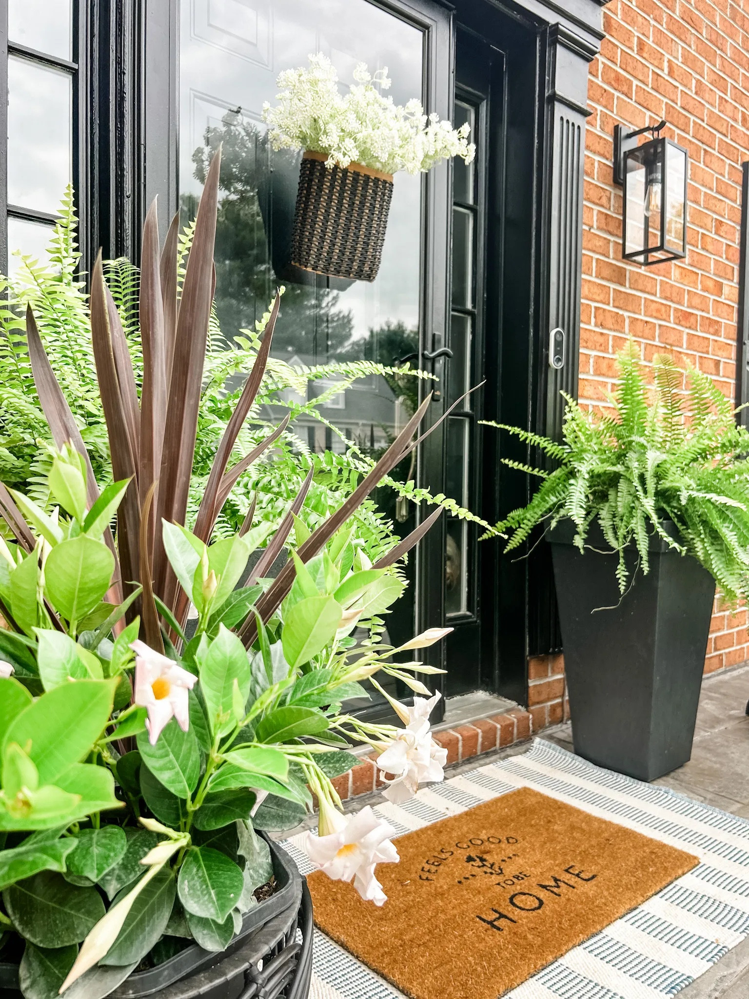 Spring porch decor.

Front porch tall planter
Outdoor rug
Striped outdoor rug
Front door mat
Black light fixture
Outdoor wall light sconce
Outdoor light fixture
Hanging flat basket
Front door decor 
Outdoor mat
Outdoor planter 

#LTKSeasonal #LTKhome #LTKfindsunder50