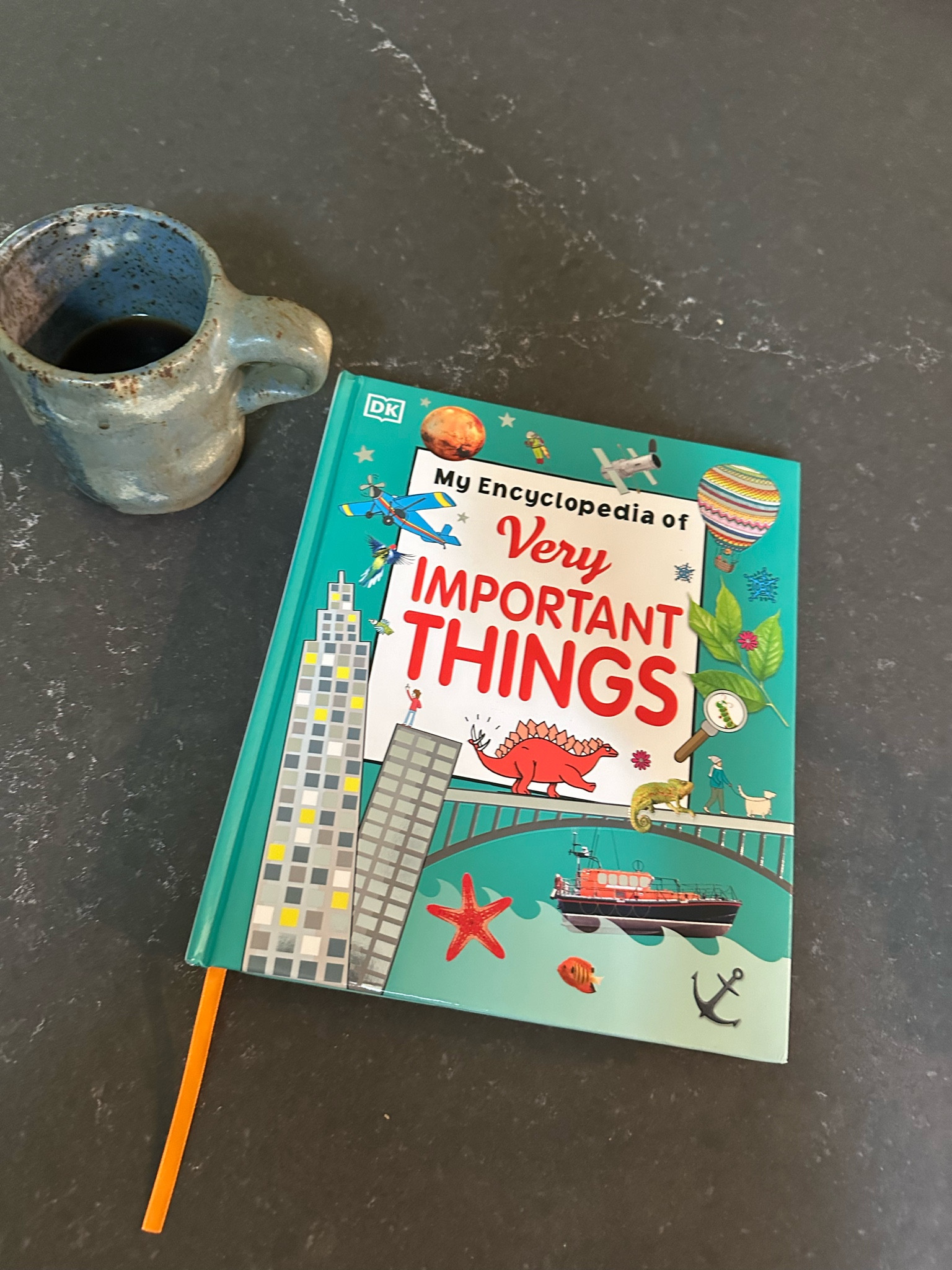 my uncle sent worth an early birthday present and he is loving it so much! he loves to look at the animal section 💛