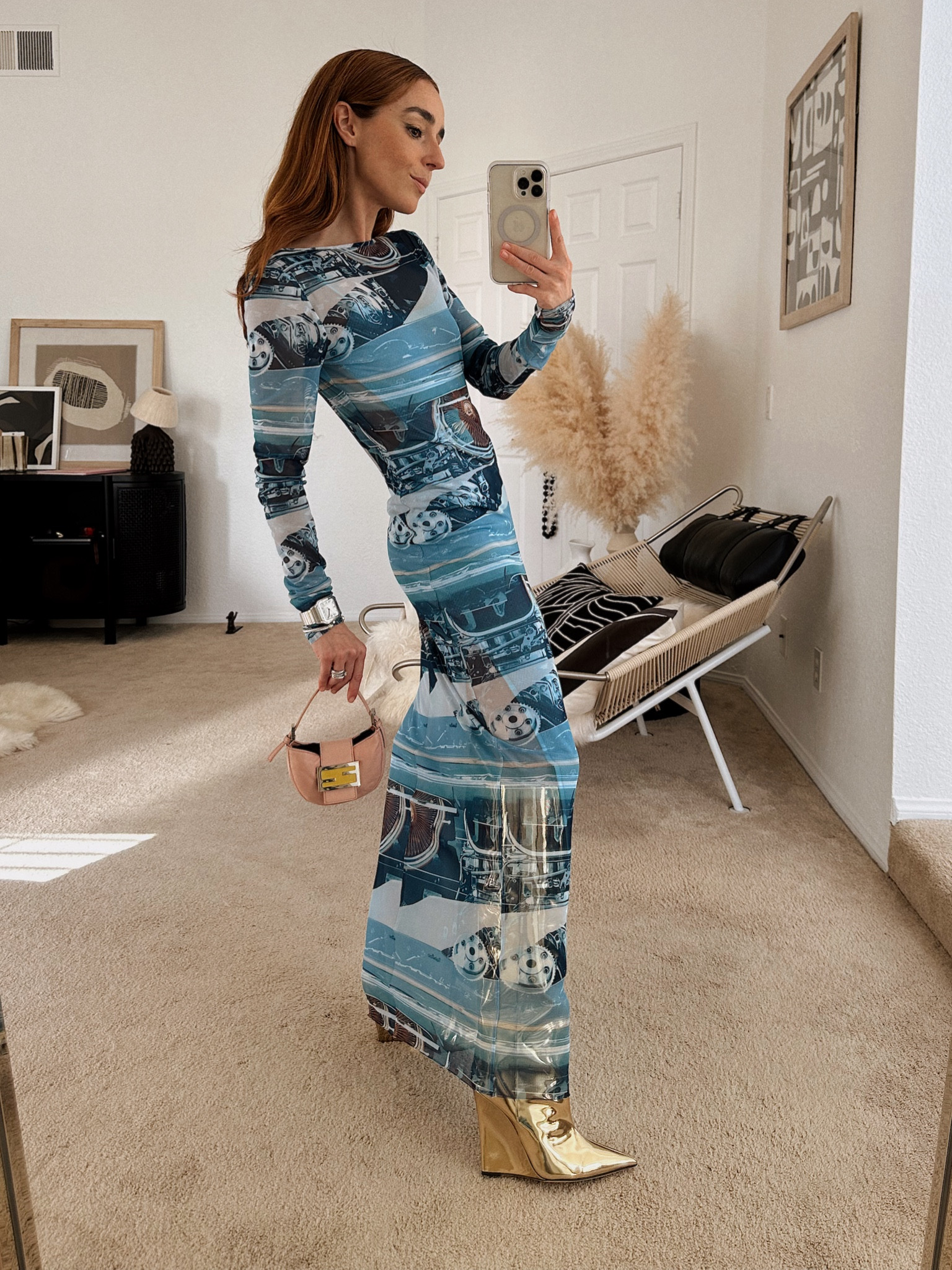 I am very into wearing maxi dresses in sheer power mesh with playful prints and in tone of blues, golds and silver. Linking exact Jimmy Choo gold Boots!

Style tip: make sure to pair your dress with fierce boots (my shoe choice of the season with everything from floor length dresses, to minis, to denim and more). 

This Laquan Smith dress is no longer available but I am linking similar long mesh dresses along with other sleeveless options featuring a low back for a sexy put together look for dinner nights and for easy to pack vacation dressing.

#LTKxNSale #LTKStyleTip #LTKSummerSales