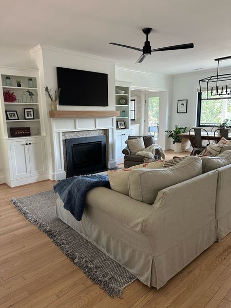 Living Room 🛋️ is feeling polished! I added a few cozy accents for fall like a couple throw blankets, branches and dried lavender, and warm toned throw pillows from downstairs!

#LTKSeasonal #LTKhome