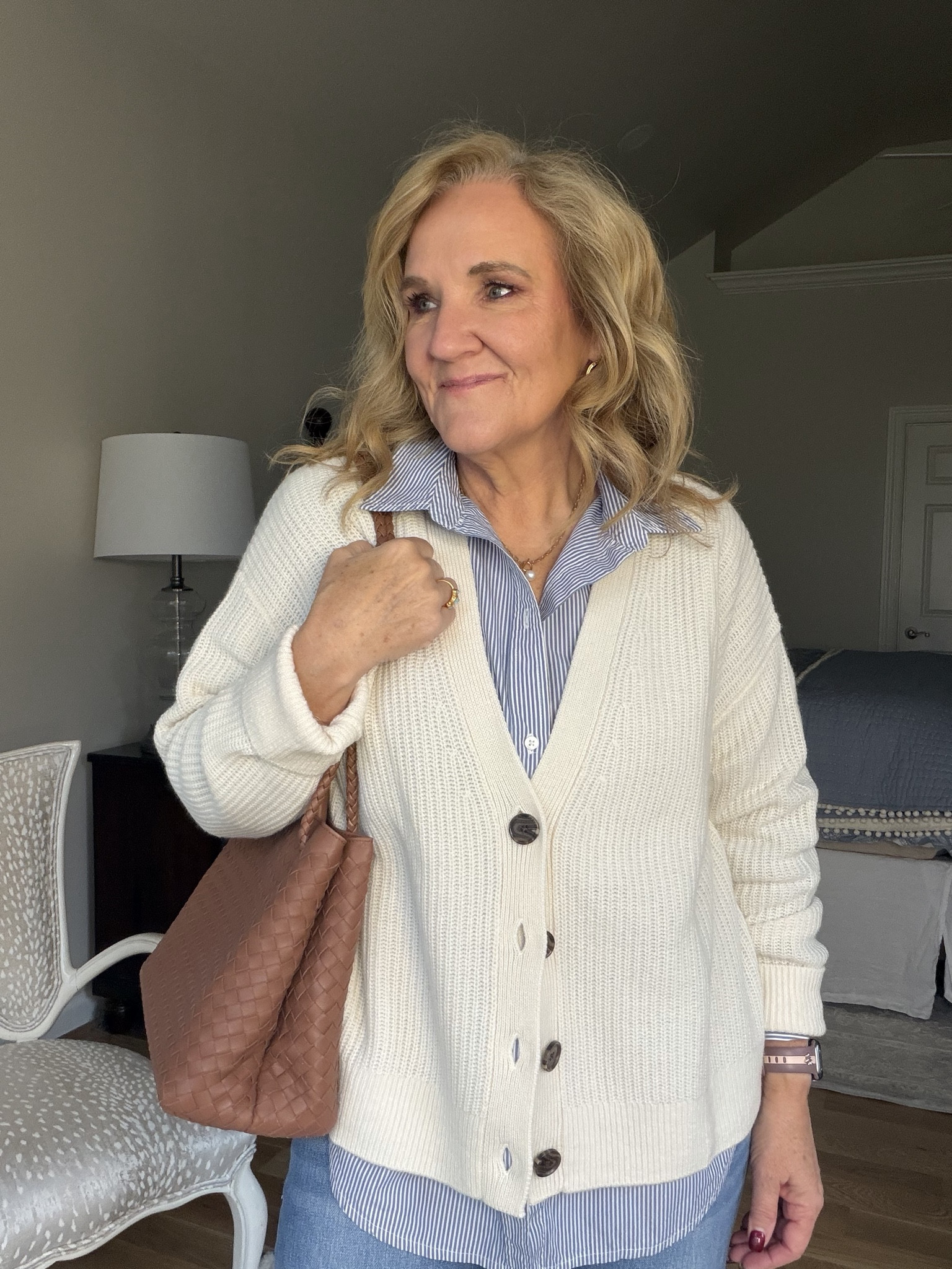 Quince relaxed casual 
Striped poplin shirt size medium 
Oversized cashmere sweater size medium 
Replaced straight jeans size 29 waist 28 inseam 
And a gorgeous bag 

Winter outfit winter white sweater 

#LTKPetite #LTKOver40 #LTKootd