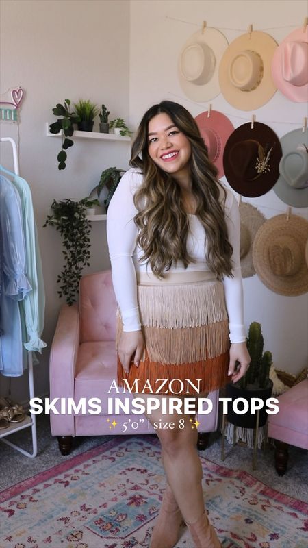 These skims inspired square neck tops are seriously THE BEST basics you can score on Amazon right now! Under $25, comes in 10 colors, and SO buttery soft! 😍🙌🏻

PUMIEY Women's Square Neck Tops - wearing medium
Don't Be Complicated Orange Multi Fringe Mini Skirt - wearing large
Break Down Walls Hot Pink Maxi Skirt - wearing medium
HIDDEN JEANS Distressed Button Fly Straight Leg Jeans - wearing 29

Easter outfit, travel outfit, work outfit, spring outfit, date night outfit, vacation outfit, Amazon finds, Amazon outfits, Amazon tops, Amazon fashion, size 8 outfits, midsize outfits, Amazon spring haul, skims vs amazon, amazon basics, skims tops 

#LTKfindsunder50 #LTKSeasonal #LTKmidsize