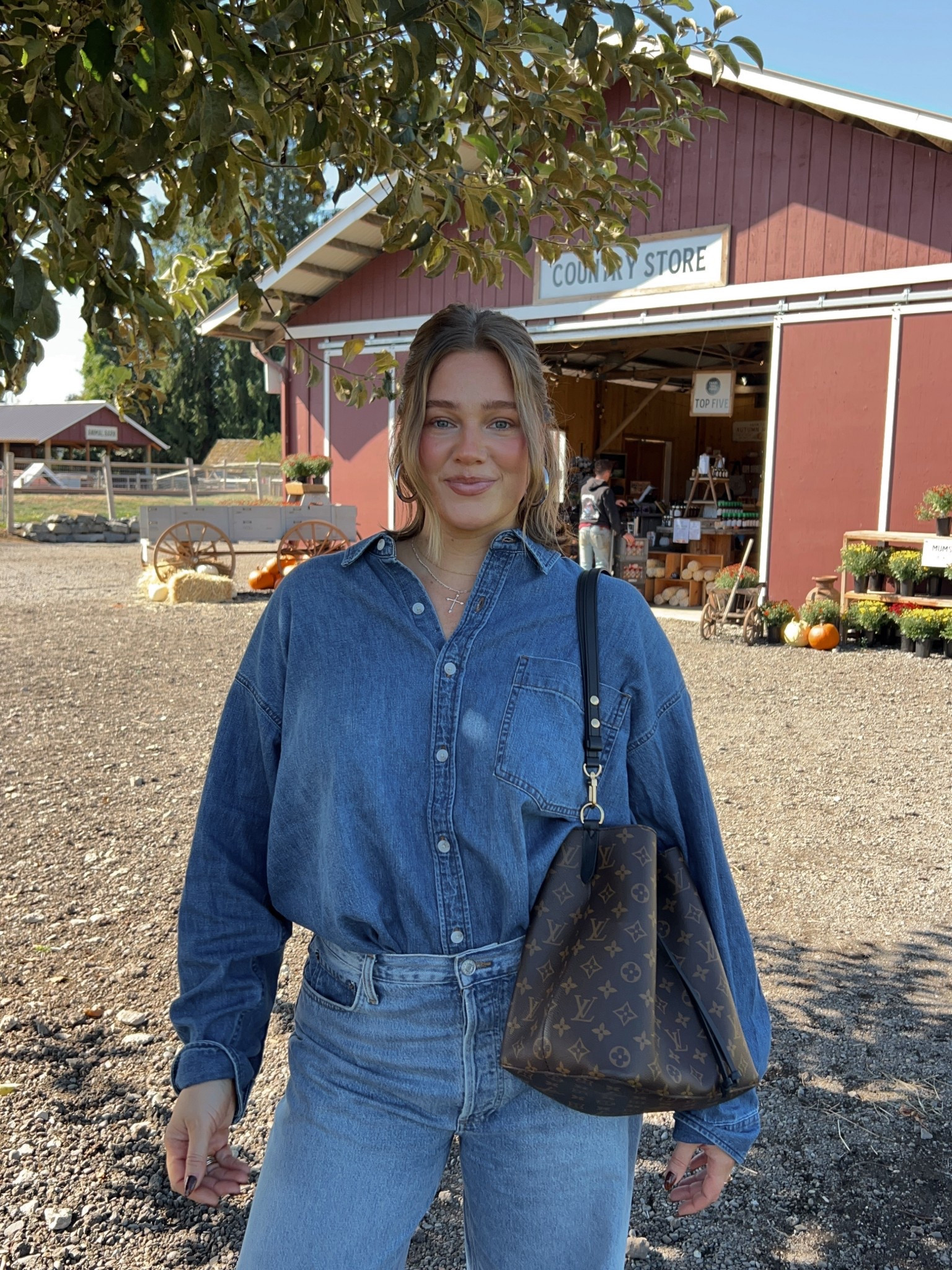Sized up in shirt to a large for super loose fit it’s long like a dress so I tucked it on. Jeans size down but I love this looser low rise fit. Boots true size I’m an 8 I buy an 8. Linked similar pair from Amazon that look exact same! 

