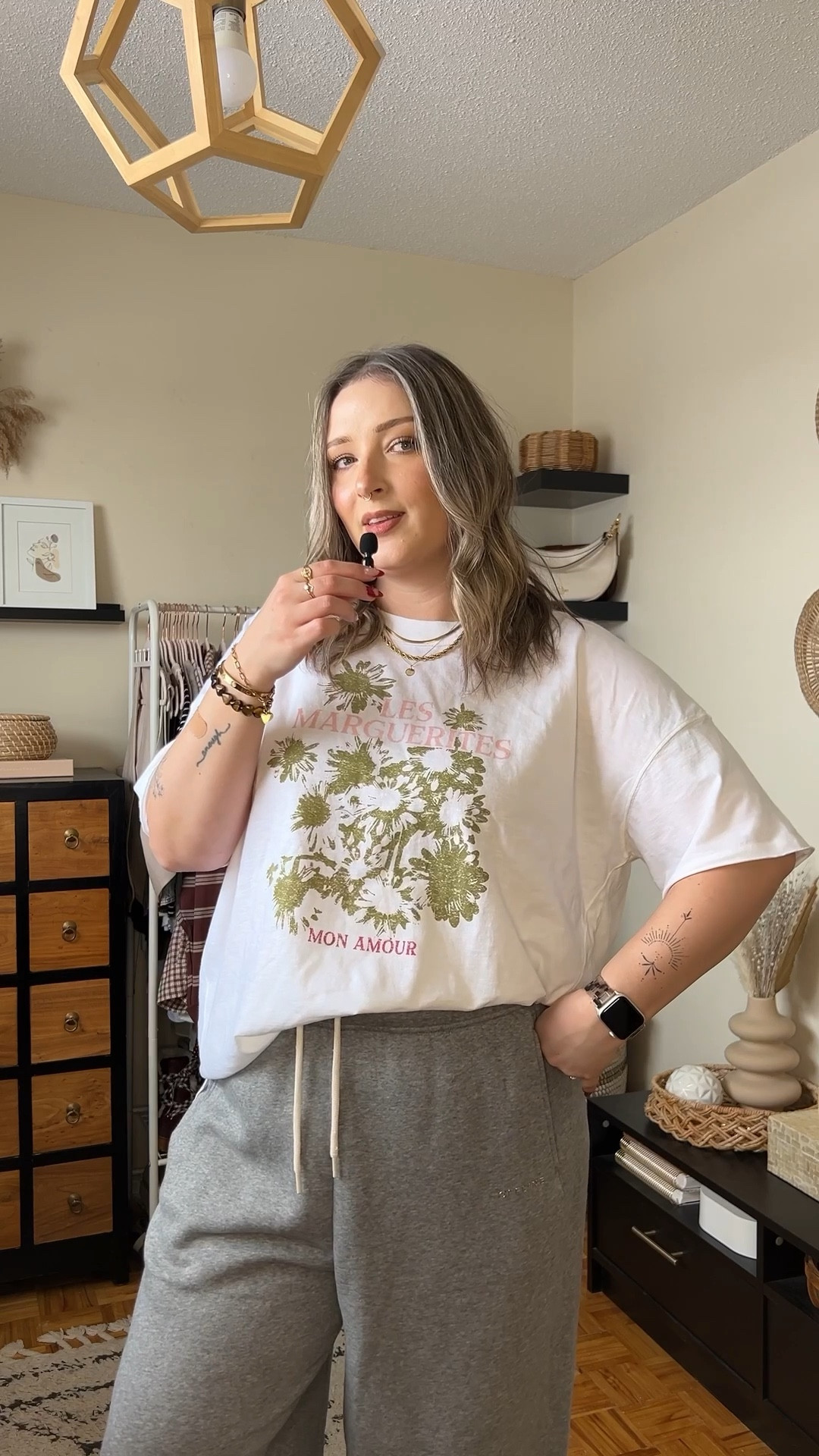 Floral graphic tee from aerie - so cute for spring! Wearing my usual size L in both tee & sweatpants


#LTKsale #LTKstyletip #LTKmidsize