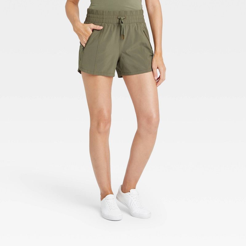 Women&#39;s Stretch Woven Mid-Rise Shorts 4&#34; - All in Motion&#8482; Moss Green S | Target