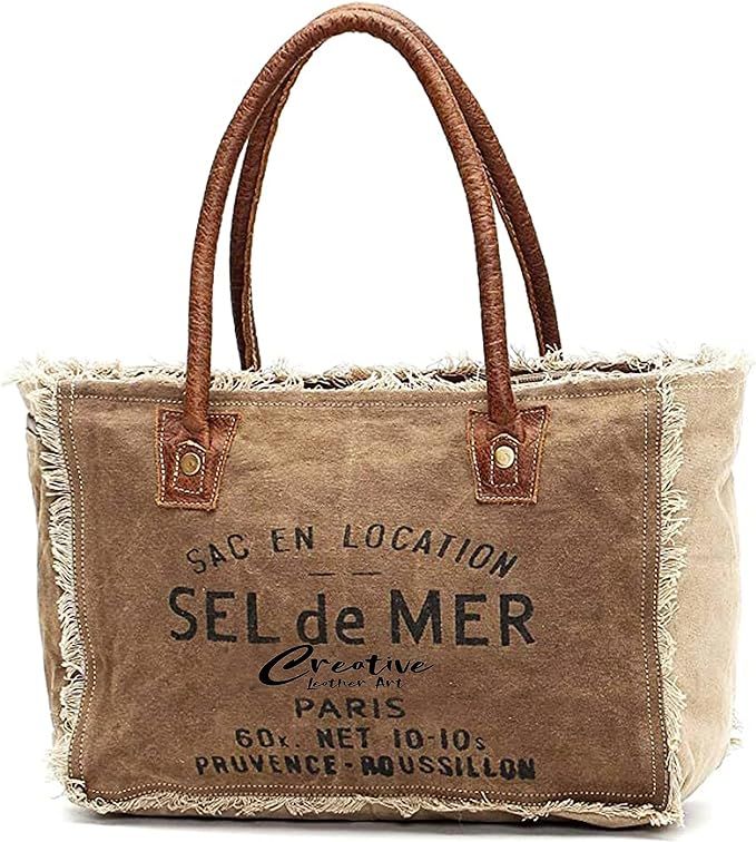 CLA Bags Sel De Mer Upcycled Canvas Hand Bag Upcycled Canvas & Cowhide Tote Bag, Upcycled Canvas ... | Amazon (US)