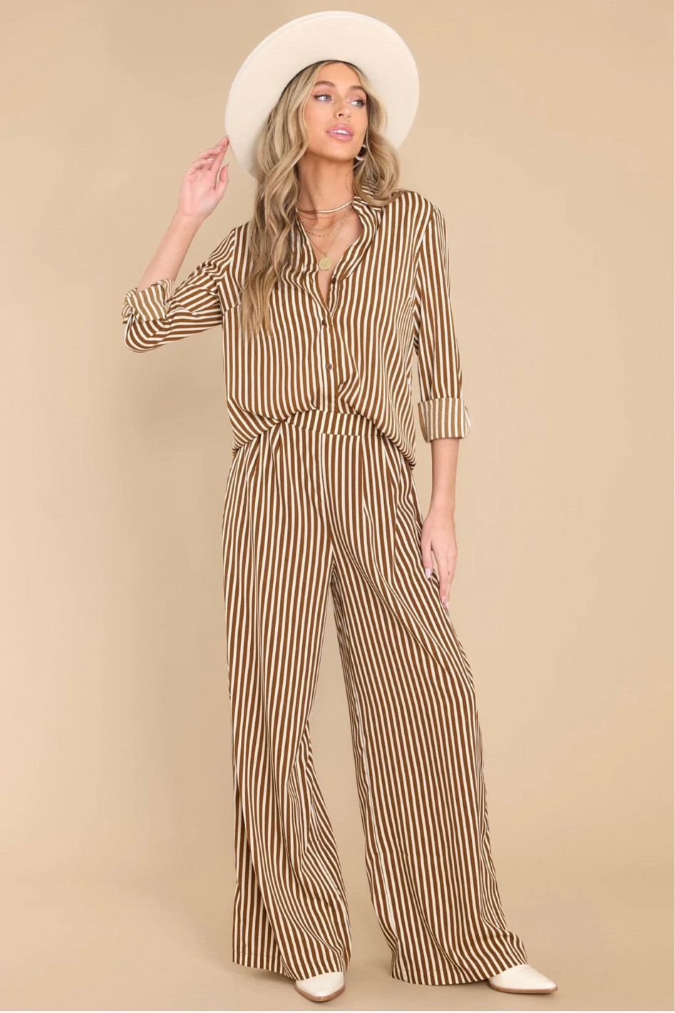 Stunning oversized brown striped top and pants set. Also comes in black!

Fall style 
Fall outfit 
Boho outfit 
Matching set 

#LTKstyletip #LTKSeasonal #LTKunder100