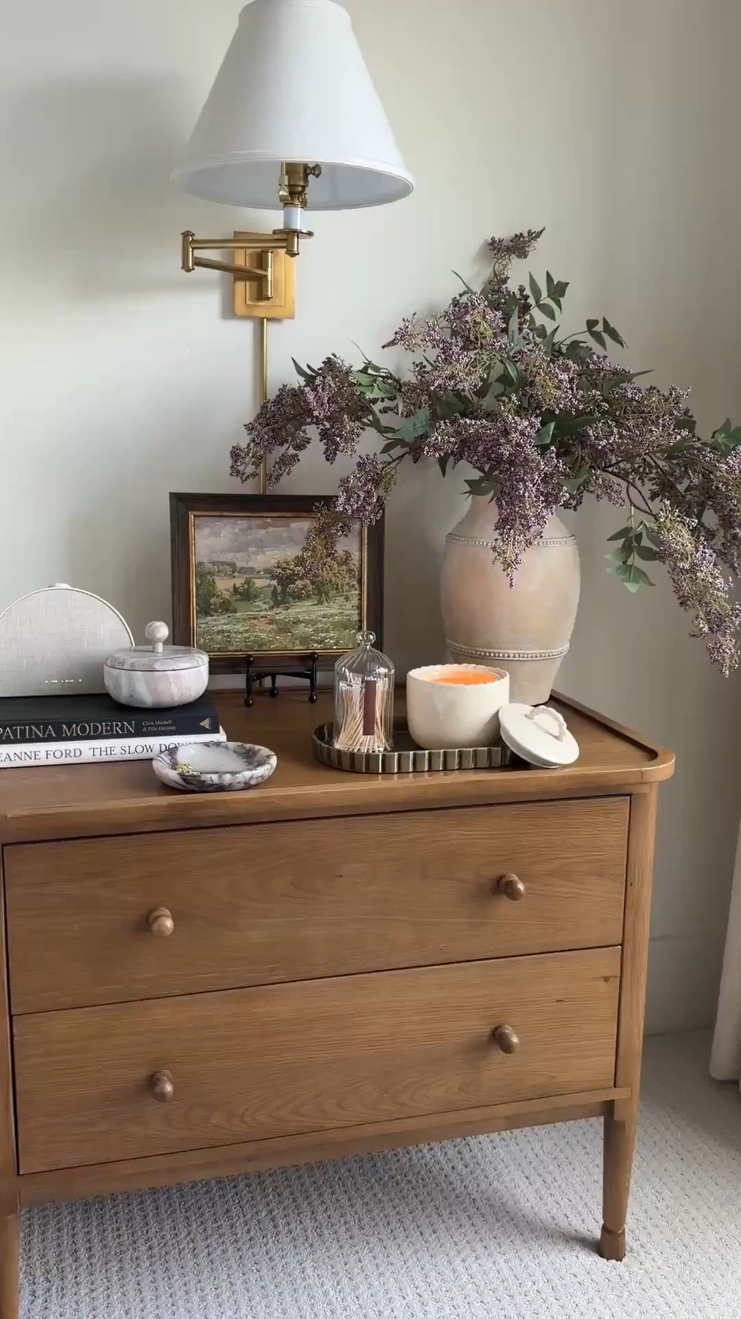 Spring nightstand styling! A mix of seasonal stems and art, functional pieces, and decorative storage for a beautiful look! 

#LTKHome