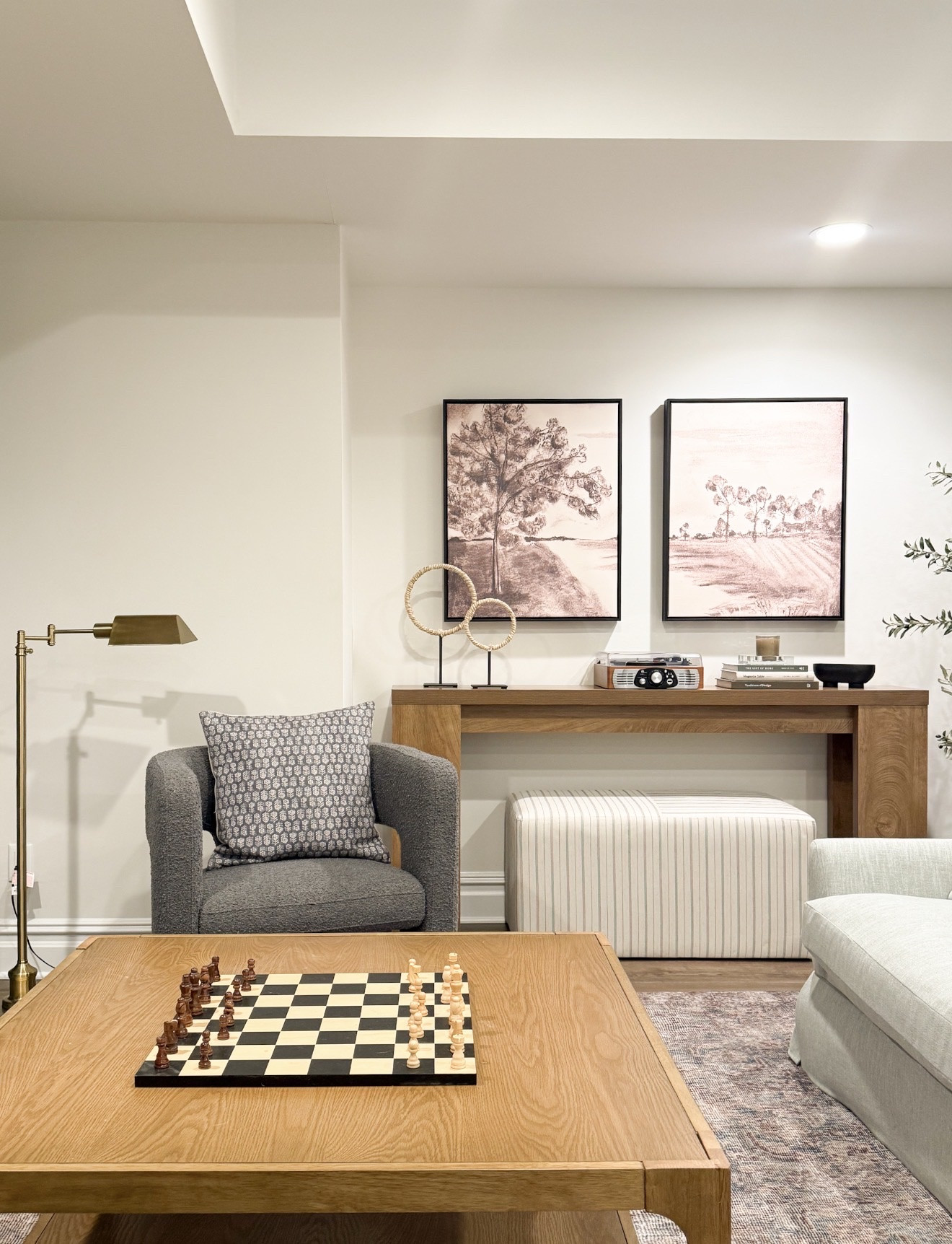 The console setup might be one of my favorite moments in the whole space. It feels styled but still simple, which is always the goal.

console table styling, neutral wall art, affordable home decor, target home finds, wayfair furniture, living room decor ideas, minimalist styling, neutral aesthetic home, modern traditional decor, styled console table, home decor inspiration, girlonthehudson

#LTKHome