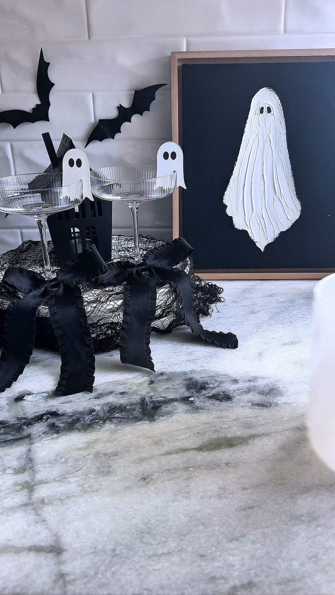 how dreamy is this spooky champagne ice bucket? i used cotton + black butterflies for a chic halloween twist 🦋🍾 pro tip: use distilled water & let it freeze overnight for a clearer look! perfect for chilling wine, champagne, or sparkling cider at your halloween party.

Ghost print came from Kirkland’s I couldn’t link it : ( 

#spookyseason #halloween #halloweendiy #halloweenideas #halloween2025 #halloweenparty #hostingideas 

#LTKSaleAlert #LTKParties #LTKHome