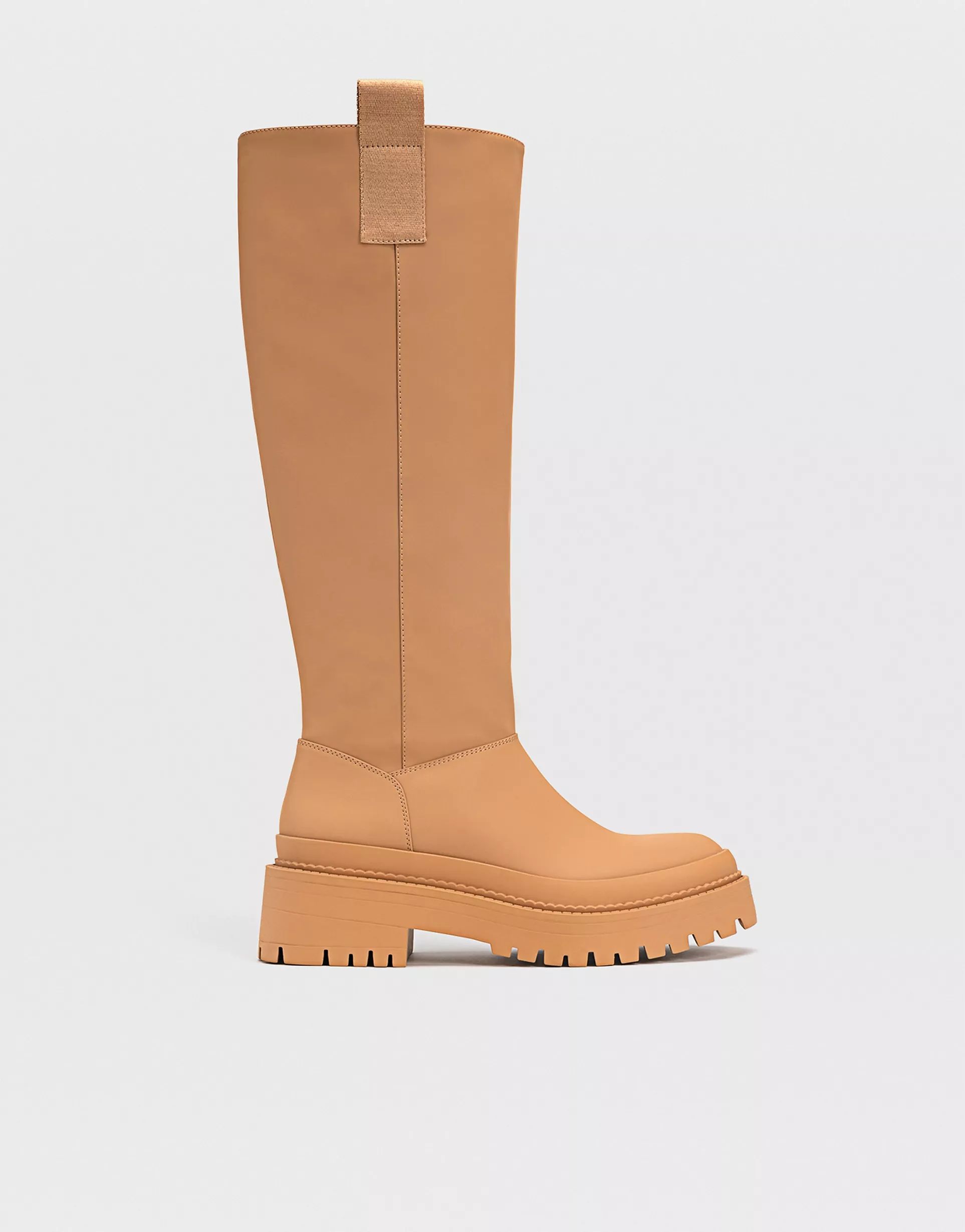 Stradivarius chunky sole high leg boots with side tab in brown | ASOS (Global)