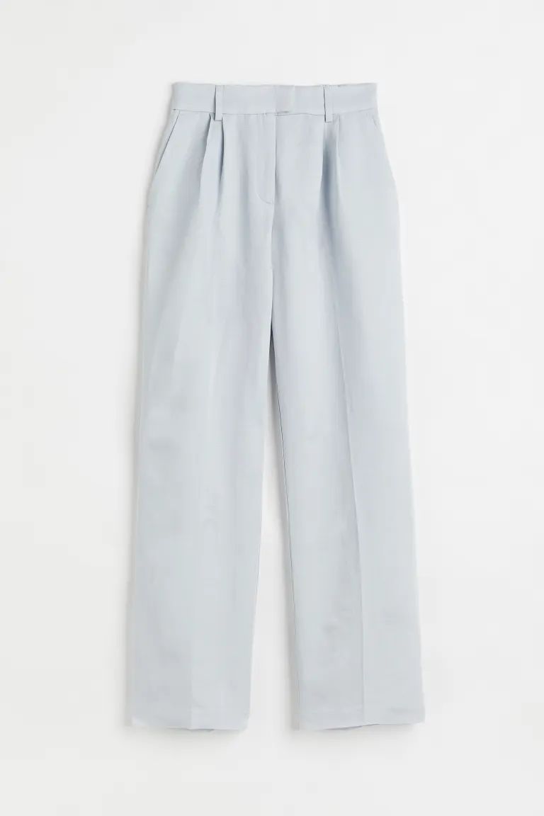 Dressy pants in viscose-blend twill made with a high waist. Covered elastic at back of waistband ... | H&M (US + CA)