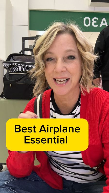 Airplane flight travel essential is this phone prop. Watch movies on tray table. Sturdy for iPads or phones. Travel outfit shirt is tts. #traveloutfit #giftidea #travelessential 

#LTKGiftGuide #LTKtravel