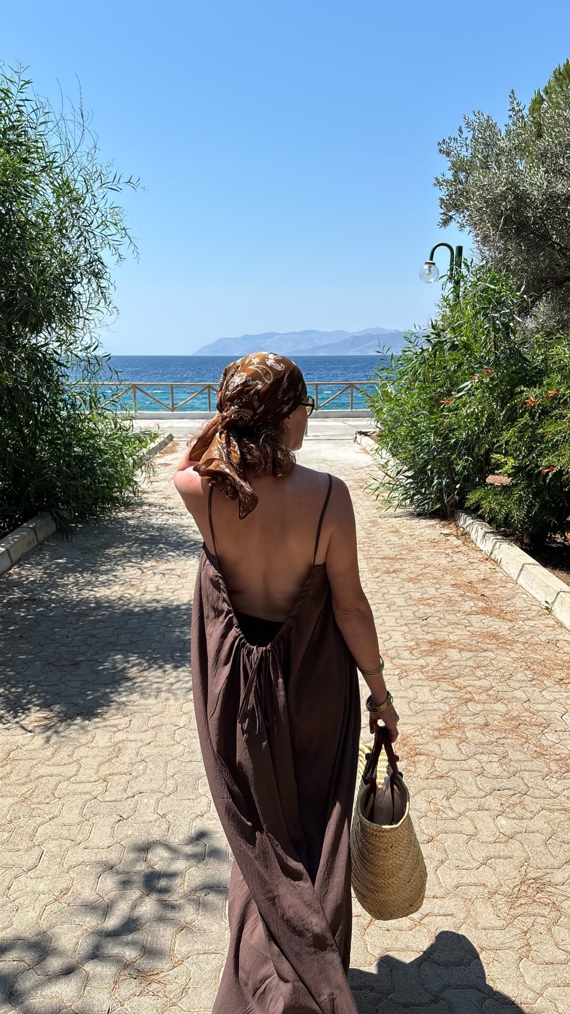 The backless dress that keeps on giving boho vibes all summer.

#LTKootd #LTKMidsize #LTKOver40
