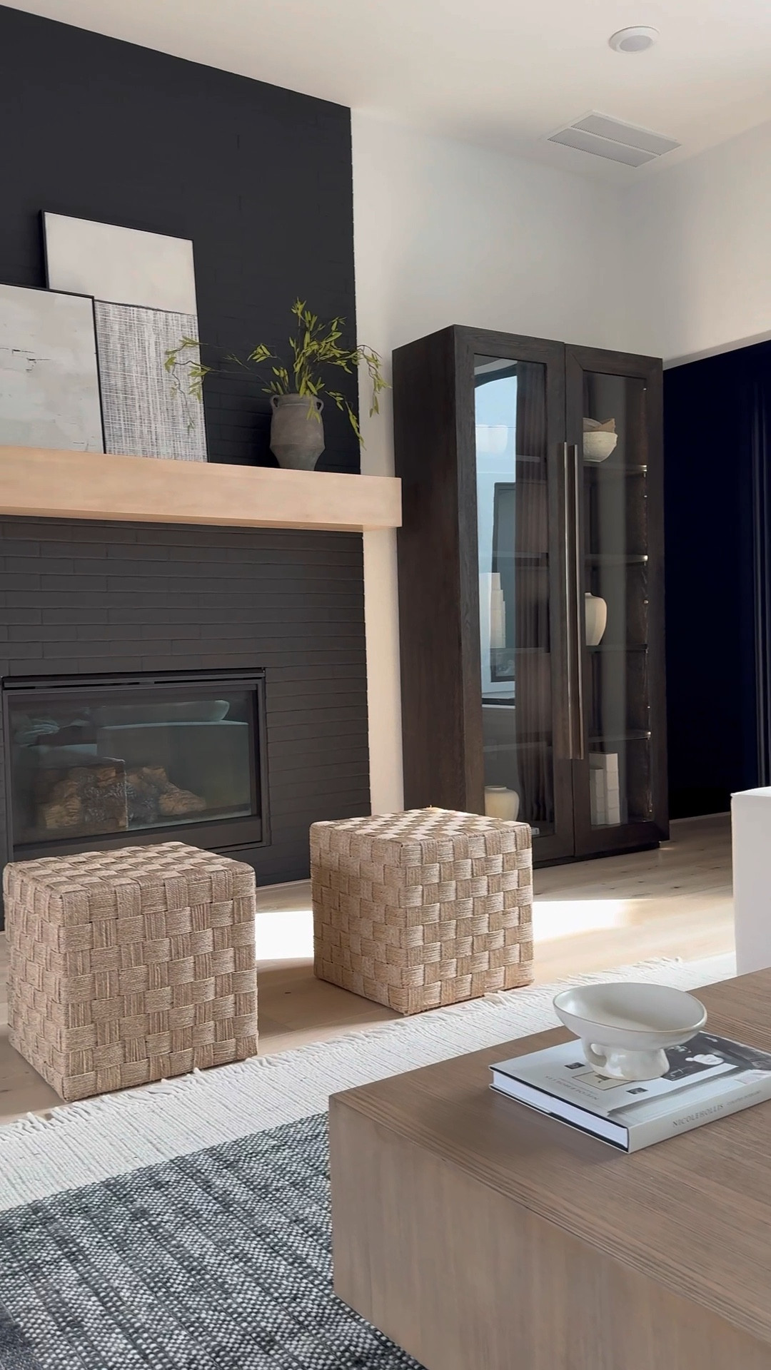 Add a stylish accent to your home with this Lynwood Checkerboard Woven Cube. This cube showcases a woven design with a checkered pattern, adding a distinctive accent to your space. Ideal for resting your feet or storing towels and throws, this natural shade cube is a versatile and functional addition to any room in your home. 

I’ve linked other items below 😁 including my drapes.🤍

#LTKSaleAlert #LTKStyleTip #LTKHome