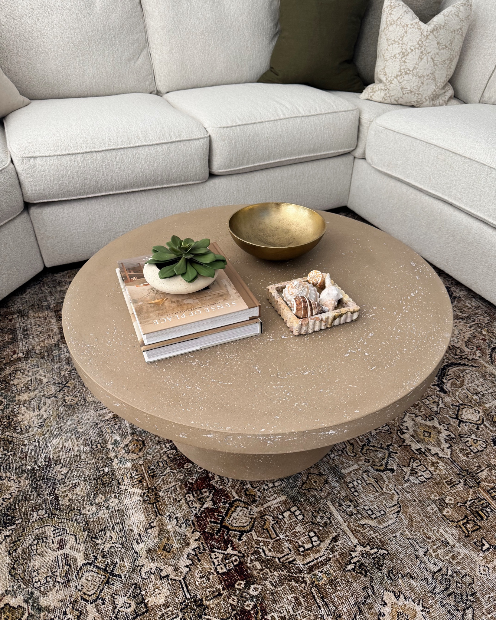 I love our concrete textured round coffee table that can be used indoors or outdoors. It’s on sale too!

#LTKHome #LTKStyleTip #LTKSaleAlert
