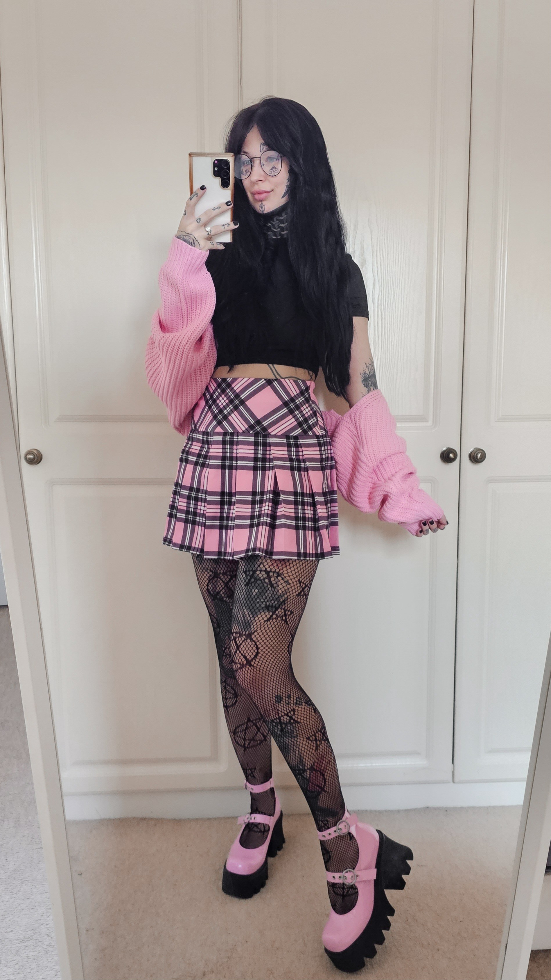Preppy pink and black alternative punk grunge outfit inspo Black baby tee / crop top Pink bolero sleeves cardigan Pink tartan plaid checkered pleated mini skirt Patterned fishnet tightsPink lamoda platform Mary Jane shoes 

#LTKfindsunder50 #LTKsalealert #LTKstyletip