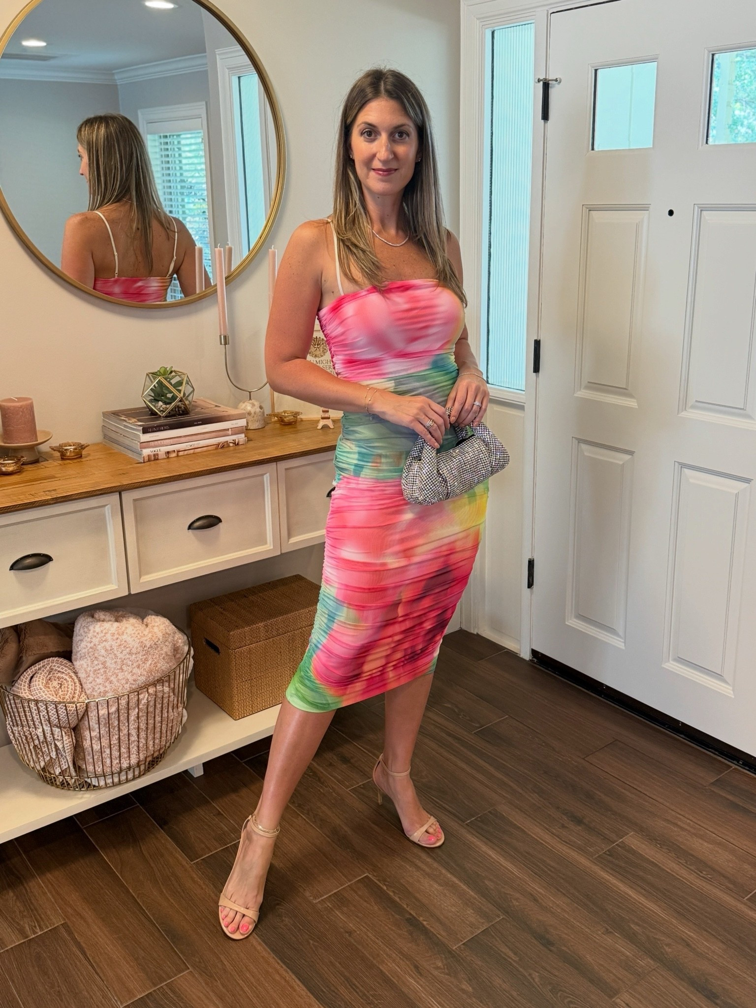 This brand has become a go-to for date nights and girls night out. The ruching is so flattering and they have tons of gorgeous prints that are fun and feminine. Best part? They’re under $100. My dress is currently 40% off!

Dress runs TTS. Wearing size M. 

Paired with my comfy stilettos (run TTS.) This style comes in various heel heights. Linked them all. 

Finished with the sparkliest of bags.

#LTKOver40 #LTKSaleAlert #LTKTall
