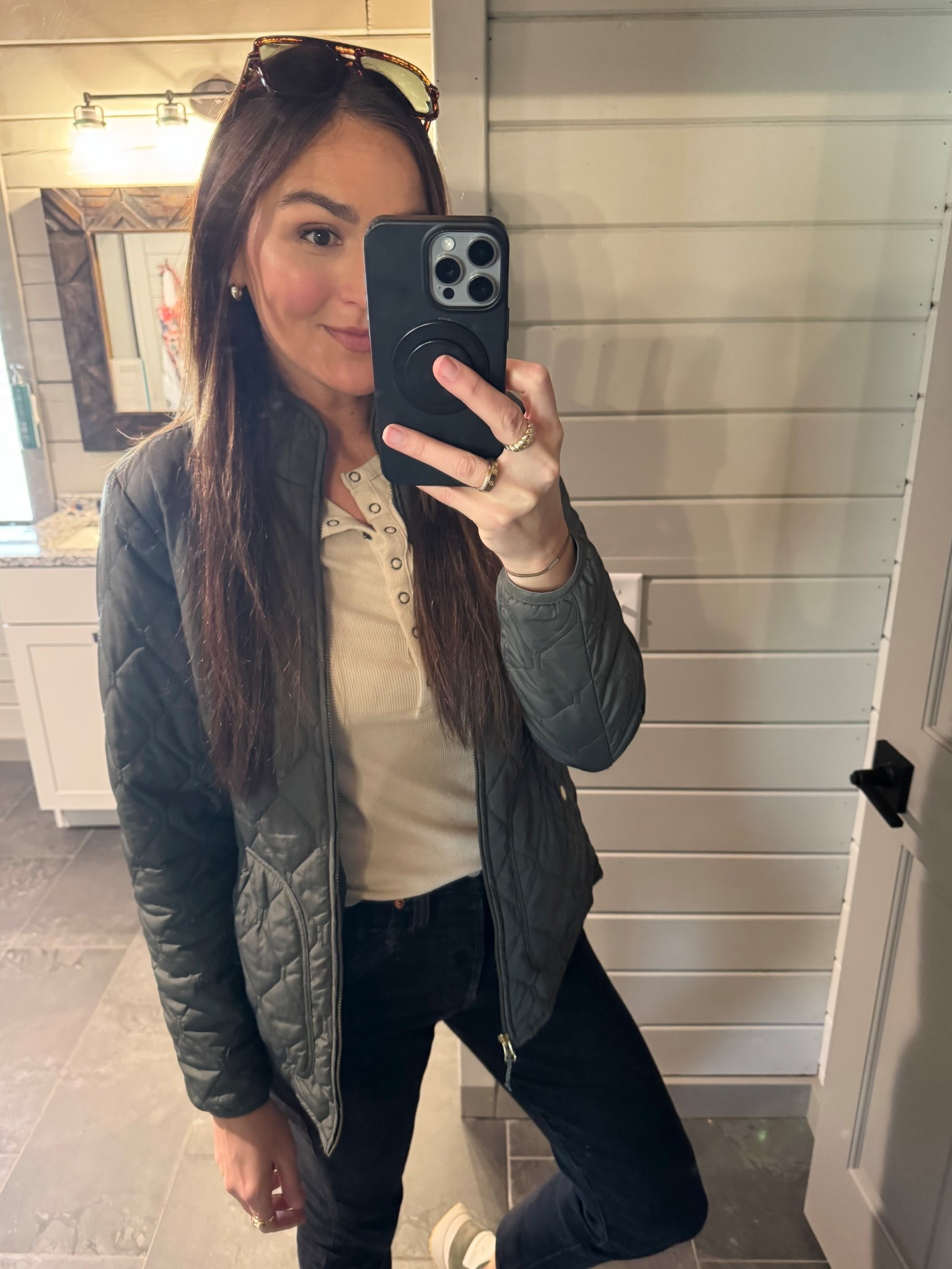 Quilted green jacket
Henley long sleeve
Black denim (you’ll wear over and over again; Levi’s wearing size 27)
Green adidas