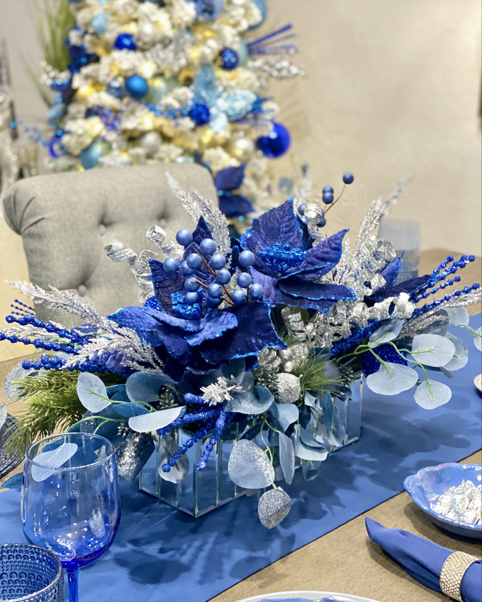 I love dressing up our table for all holidays! Of course it must match all Christmas decor 💙🩵 I made the centerpiece when I saw the mirror vase on Amazon!

#christmastablescapes #holidaytablescapes #blueandsilver #holidaydecorating #howtodecoratetable #holidaytable #christmastable #DIYtablescapes 

#LTKFindsUnder50 #LTKSeasonal #LTKHoliday
