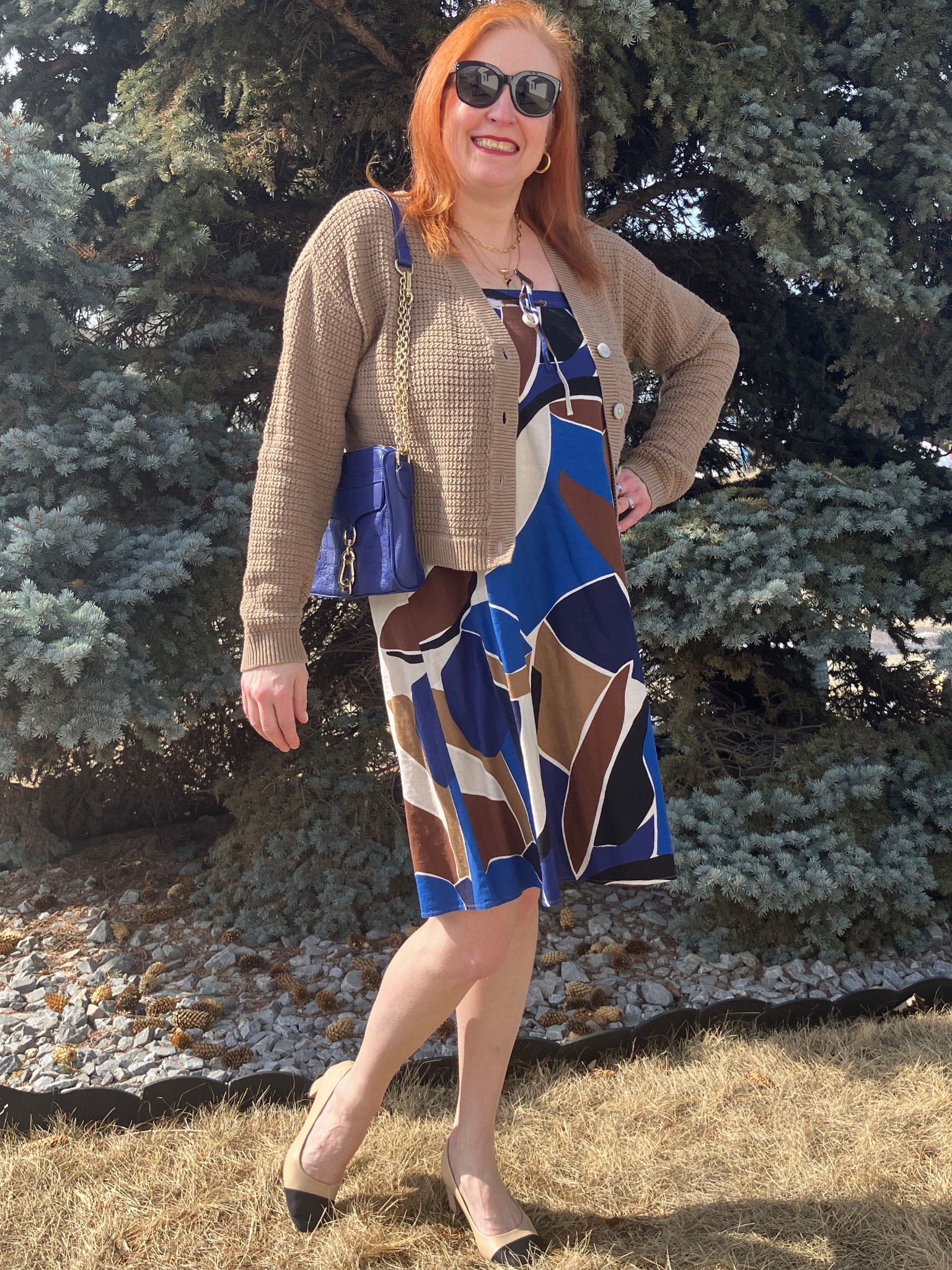 I’m caught up in this look! I can wear it to church tomorrow if I want to. I took one of my favourite skirts and pulled it up to wear as strapless dress. Then I threw on my beige cardigan, blue purse, and capped toe heels. I am doing my best to welcome spring in the hopes it actually stays this time even though there is snow forecasted for this coming week. 😫 In the meantime you can catch me living in denial. Canadians click on the first links to shop, and Americans click on the second links to shop. If there’s only one link then you can shop it in your own country. And remember, trendy doesn’t have to be expensive! Bye!

#LTKootd #LTKOver40 #LTKSeasonal