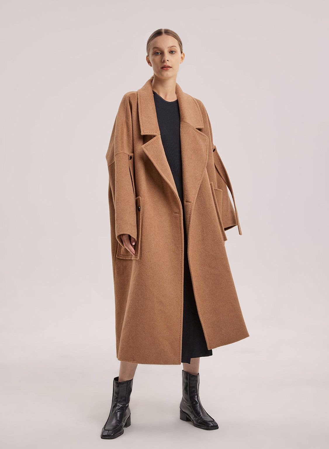 This coat design has a delicate balance between classic and modern styles. This coat is made from... | Gentle Herd