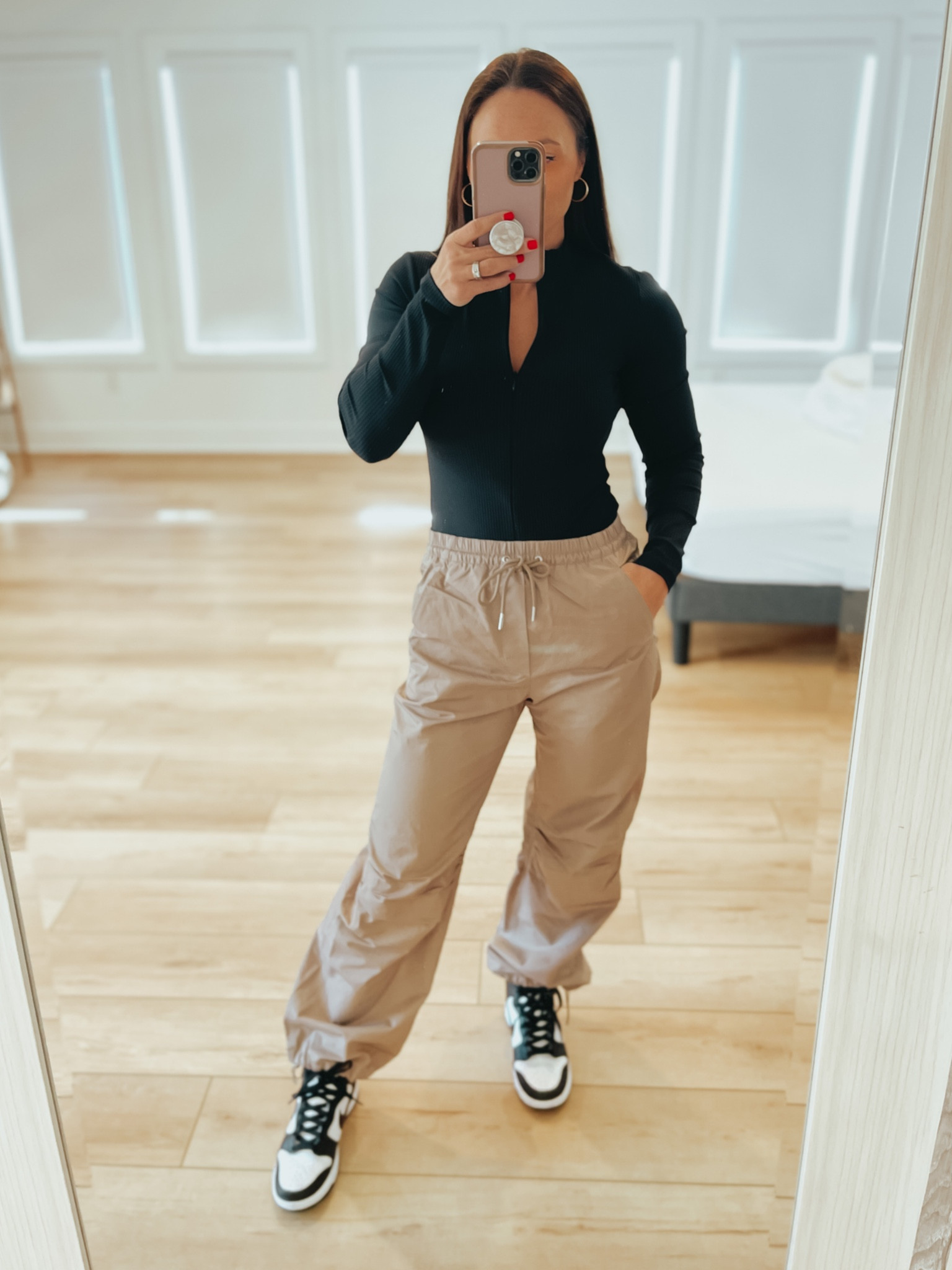 Women’s utility pants - has a drawstring ankle
Mock neck zip up bodysuit
Womens Nike dunk
Everything fits true to size. 

#LTKshoecrush #LTKunder50 #LTKstyletip