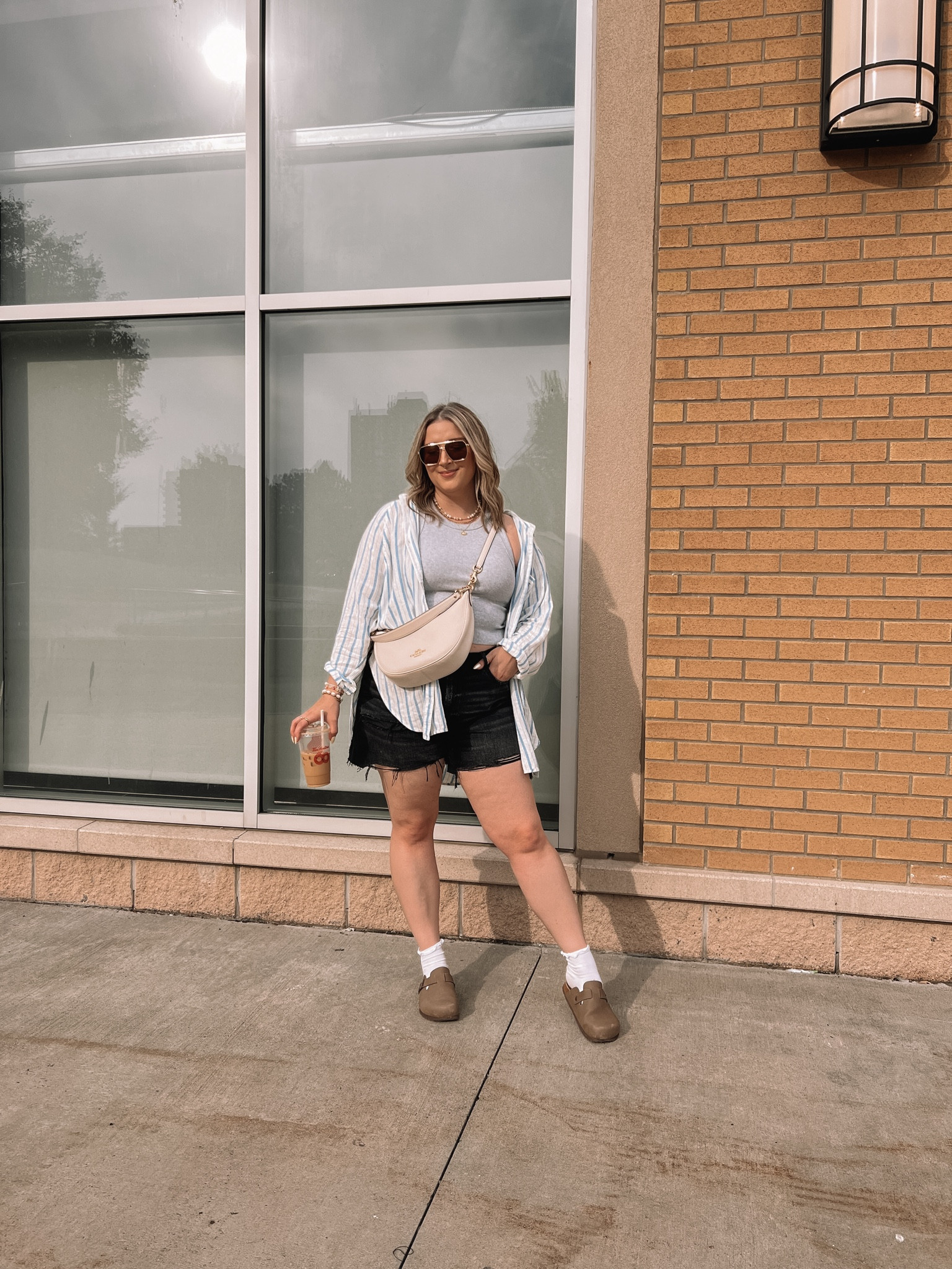 Black denim shorts (sized up to 16 for a baggy fit), basic tank top (L), striped linen button up (L), Birkenstock inspired clogs (size up), coach bag

Casual midsize summer outfit


#LTKcanada #LTKsummer #LTKmidsize