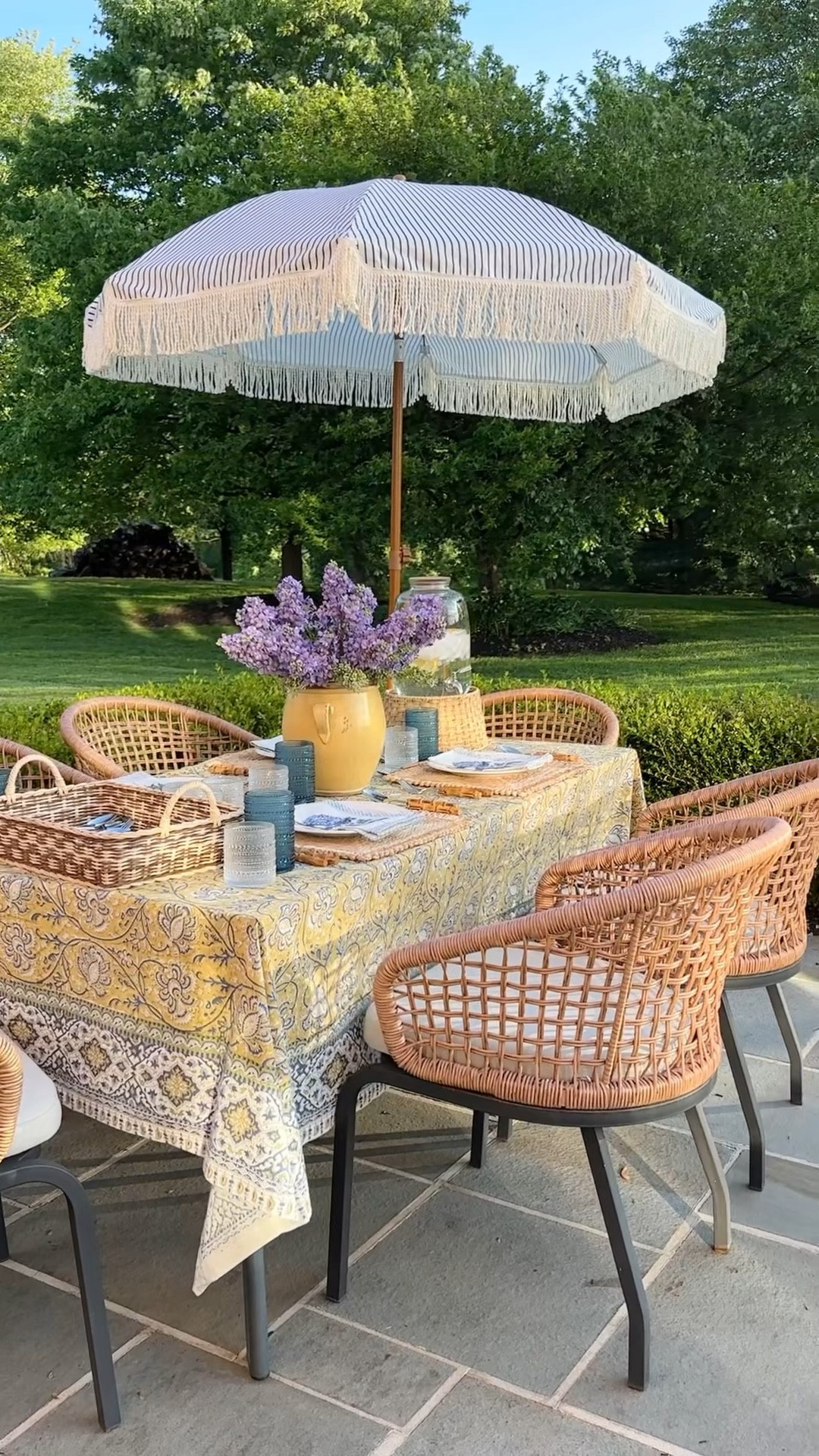 Patio decor, beaded drinking glass, block print tablecloth, cloth napkin, ceramic vase, bamboo flatware set, woven placemat, glass beverage dispenser, rattan beverage dispenser stand

#LTKFind #LTKhome #LTKstyletip