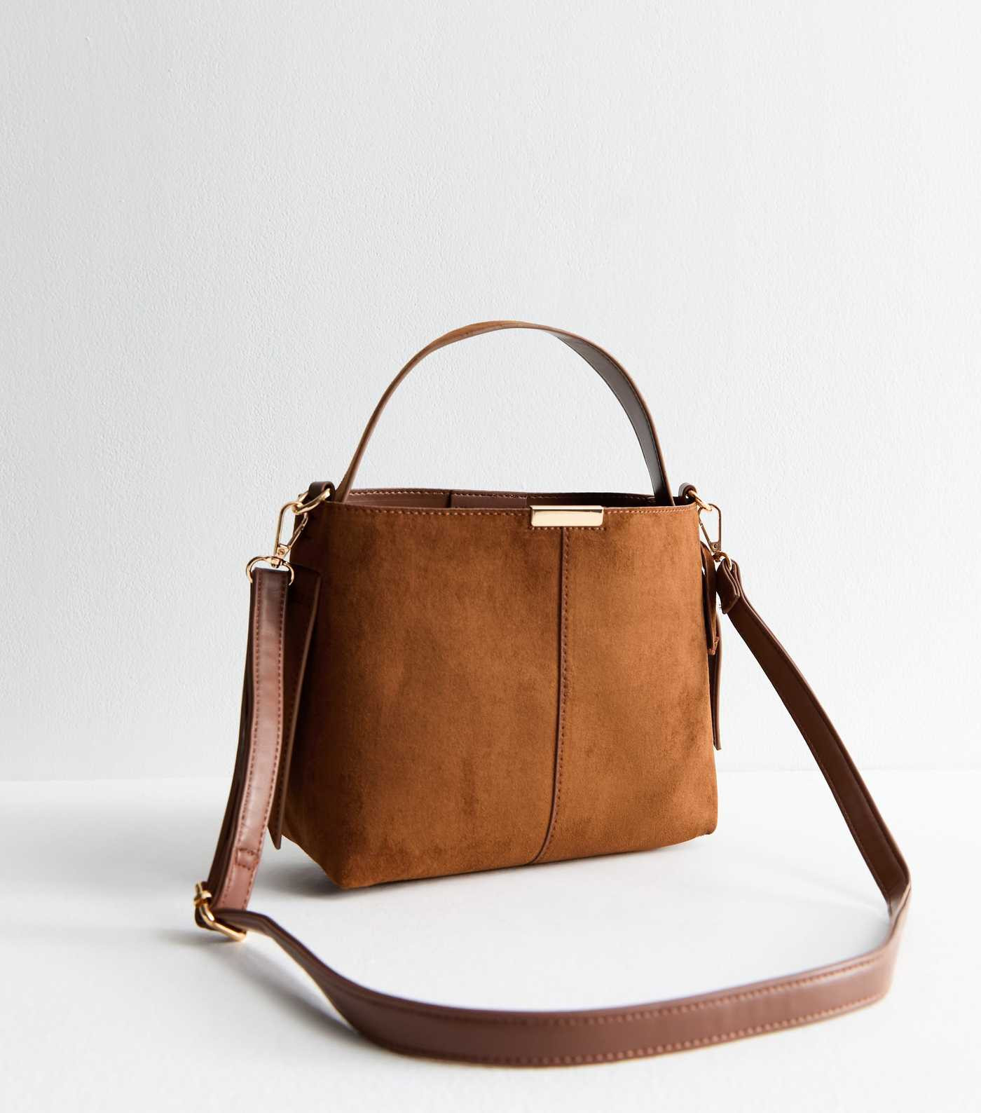 Tan Faux Suede Buckle Detail Shoulder Bag
						
						Add to Saved Items
						Remove from Saved... | New Look (UK)