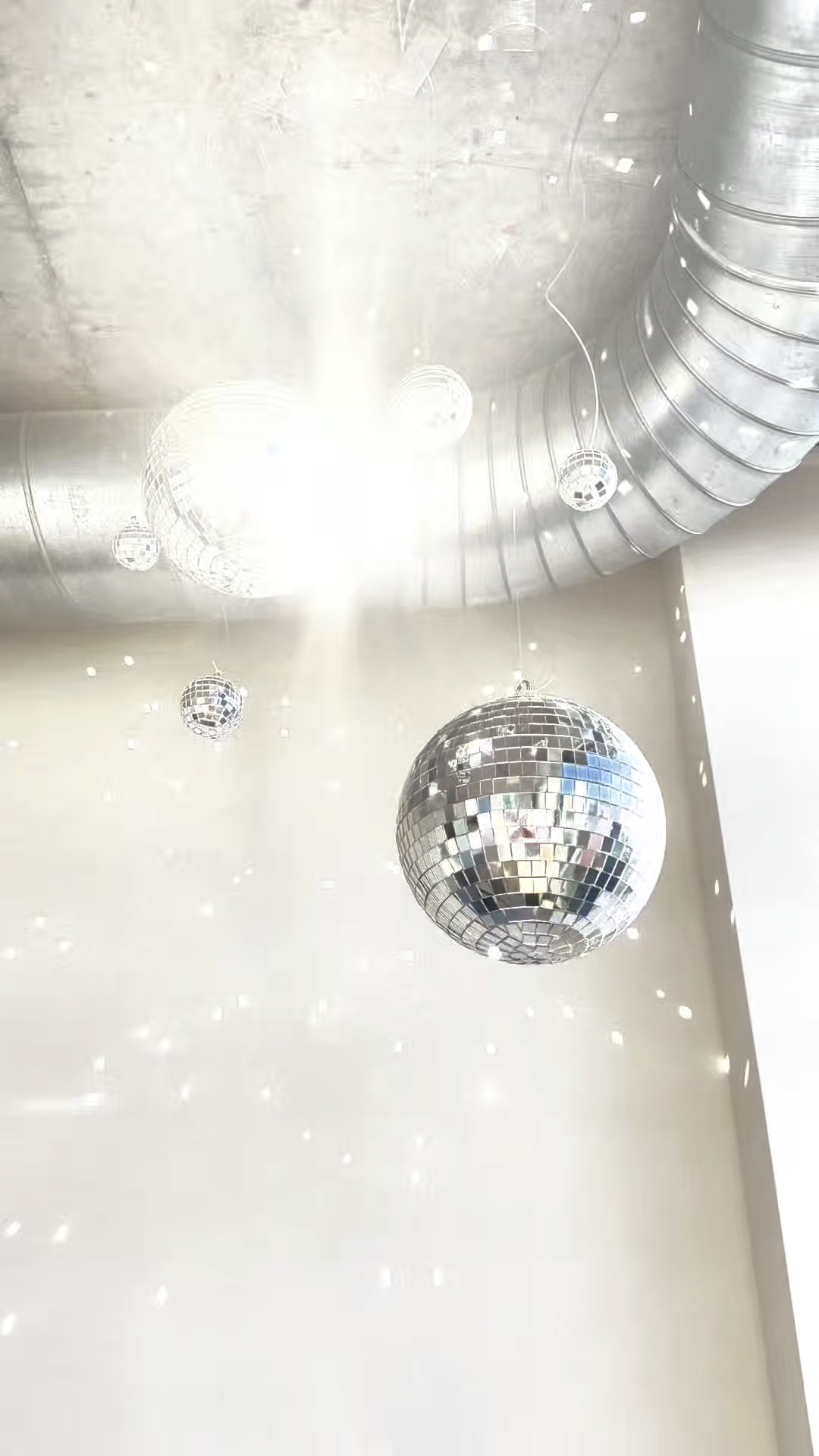 Disco balls make everything better. Disco ball decor and party decorations are a whole personality.

For this installation I used 6 different disco balls and hung them from my ceiling! I love how the light reflects off of them in the morning at sunrise and at sunset at night. The reflections dance on my walls all day long and it makes me so happy ☺️✨🪩

#LTKHome #LTKdayinmylife #LTKstorytime