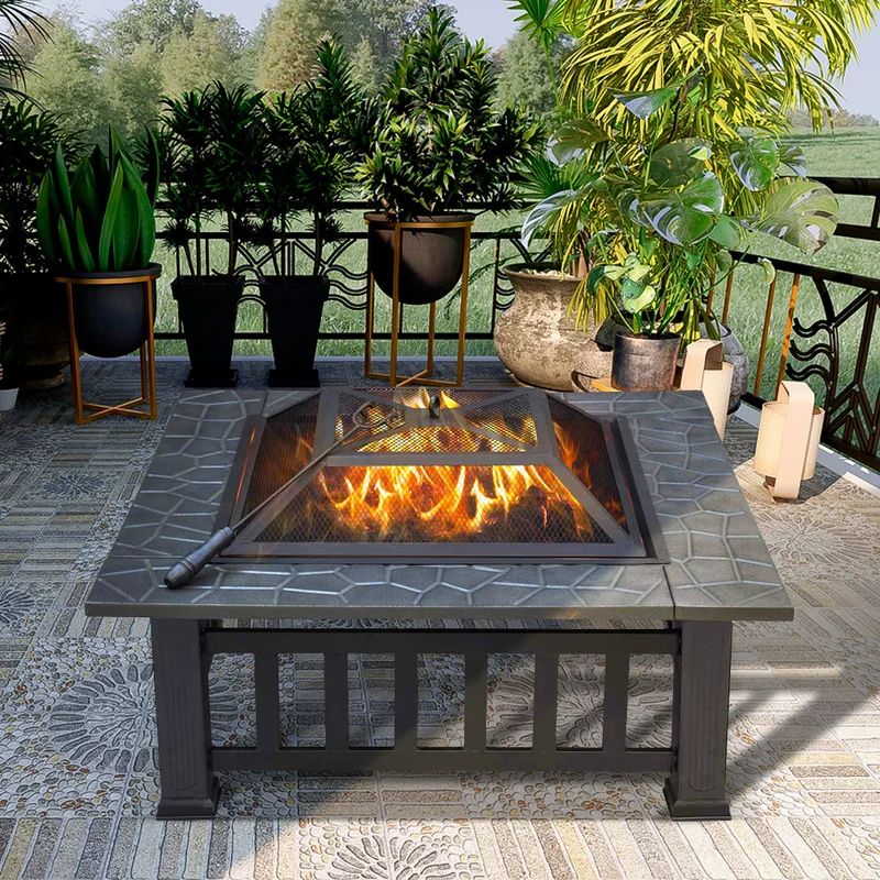Handerson 14.4'' H x 32'' W Steel Wood Burning Outdoor Fire Pit with Lid | Wayfair North America