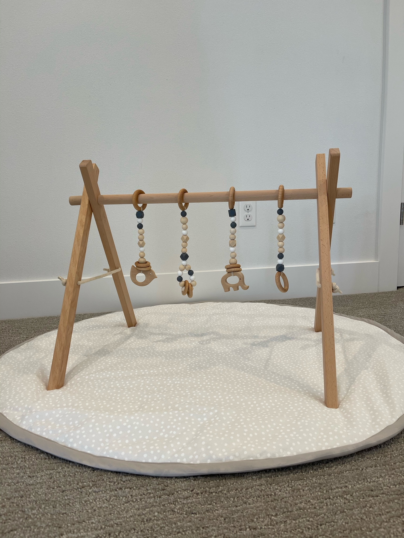cutest baby play gym 😍
not only is this play gym aesthetic and cute, it’s also a perfect option for newborn and baby development with high contrast beads for baby vision and animal grips that can help baby with hand eye coordination, and adjustable height this is the perfect addition for your home nursery, playroom, or baby gift 👼🏼
play mat was a custom made gift, will link other options I love as well

#LTKBump #LTKHome #LTKBaby