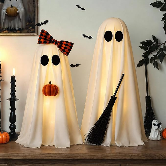 Your living room but make it spooky 👻🖤 Amazon ghost figurines are stealing the show 🎃✨ #livingroomdecor #ghostdecor #halloweenhome #cozyhome #ltkhome 

 #LTKSeasonal #LTKHome #LTKSaleAlert