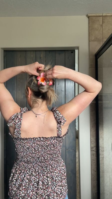This is an easy hair tutorial. Flower clip makes it look girly 

#LTKSeasonal #LTKbeauty #LTKVideo
