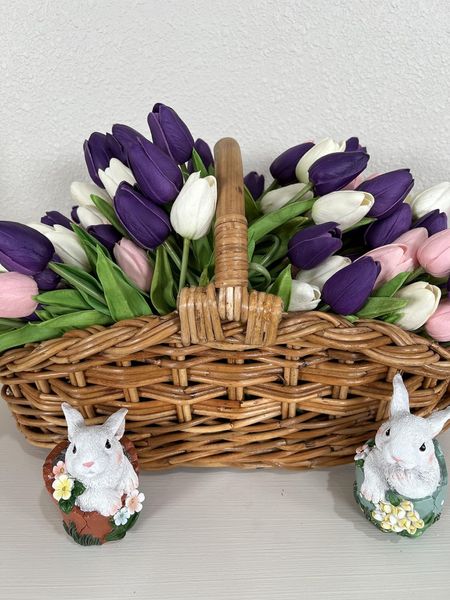A pretty basket full of faux tulips and a couple of bunnies sets the mood for spring decor! #home #amazon #amazonhome #founditonamazon #springdecor #easterdecor #easterbunny #easterbasket #basket #bunny 