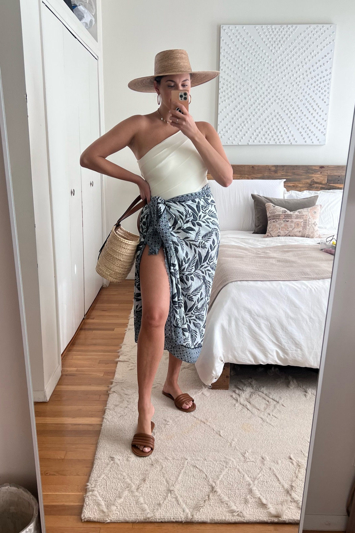 Beach vacation outfit, pareo, sun hat, white one piece swimsuit, summersalt, sidestroke swimsuit, brown sandals, summer sandals, loewe basket bag, Loewe

#LTKFestival #LTKFind #LTKSeasonal
