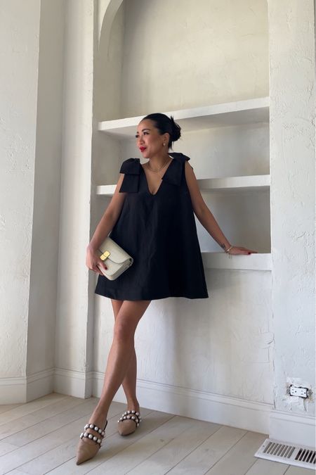 Such an interesting LBD! This black dress is postpartum friendly, has a fun flare silhouette and so effortless! 

For size reference, I’m 5 ft 105 pounds and wearing a size 2.

Lip color - Fiery 

#LTKParties #LTKStyleTip