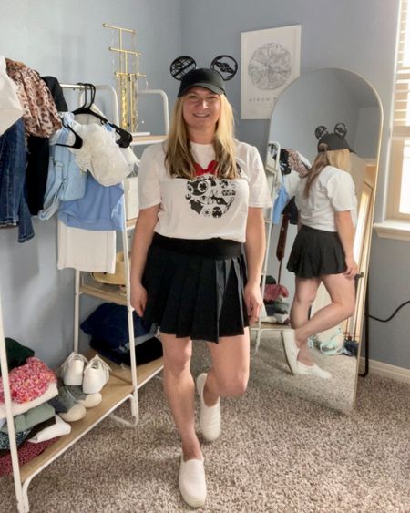 Walt Disney World Hollywood Studios outfit: black skirt from American Eagle, cute Disney outfit, Minnie Mouse top, Star Wars Disney tee, white sneakers, Star Wars hat 

#LTKFind #LTKtravel #LTKstyletip