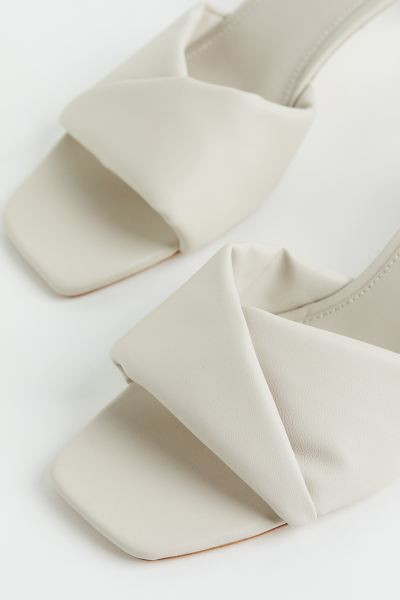 New ArrivalSandals in faux leather with square toes, lightly padded crossover foot strap, and cov... | H&M (US + CA)