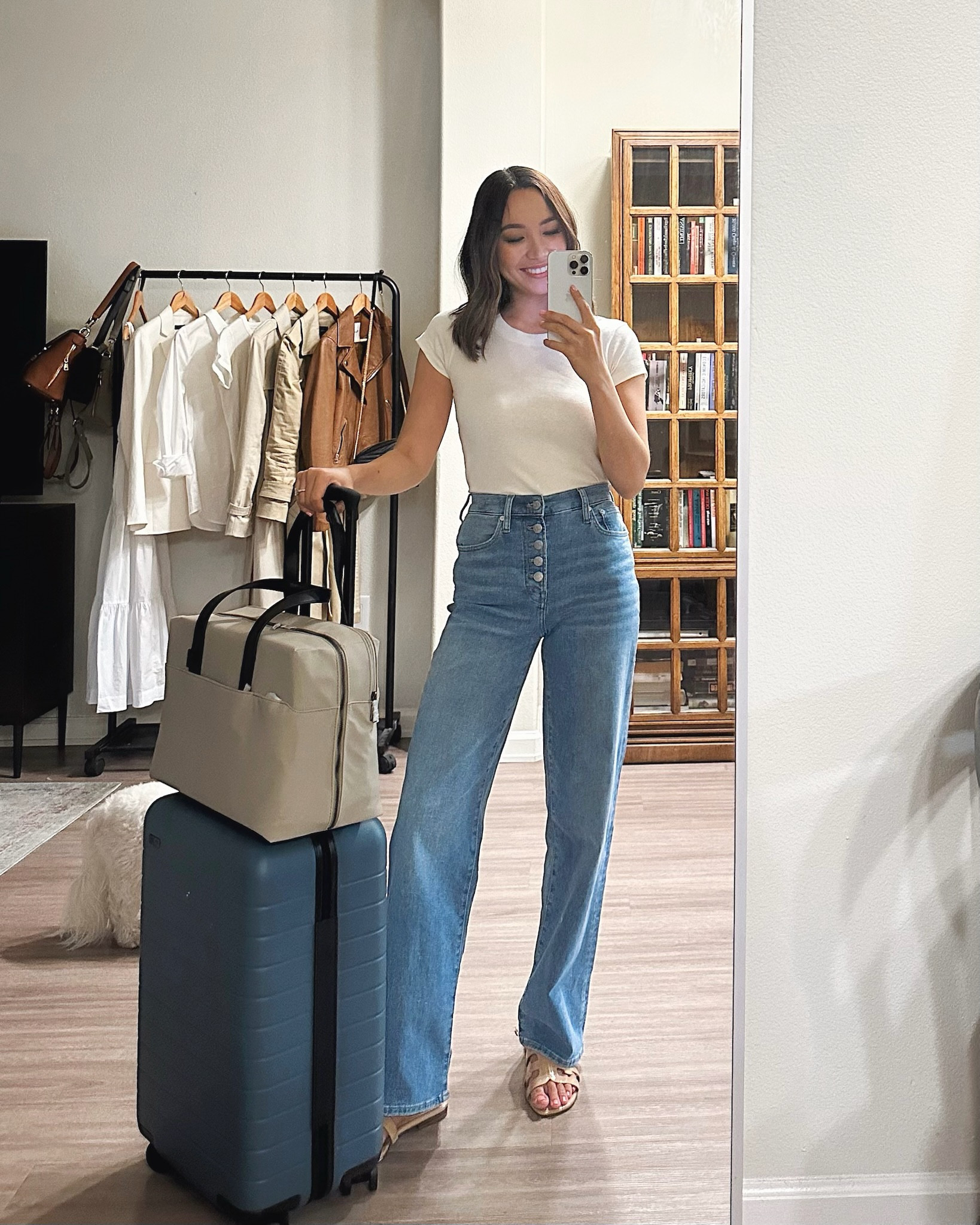 Travel outfit inspo roundup 

Away luggage 
Wide leg Madewell jeans 
White tee 
Bay sandals 

Summer travel / travel outfit / airport 

#LTKunder100 #LTKworkwear #LTKtravel