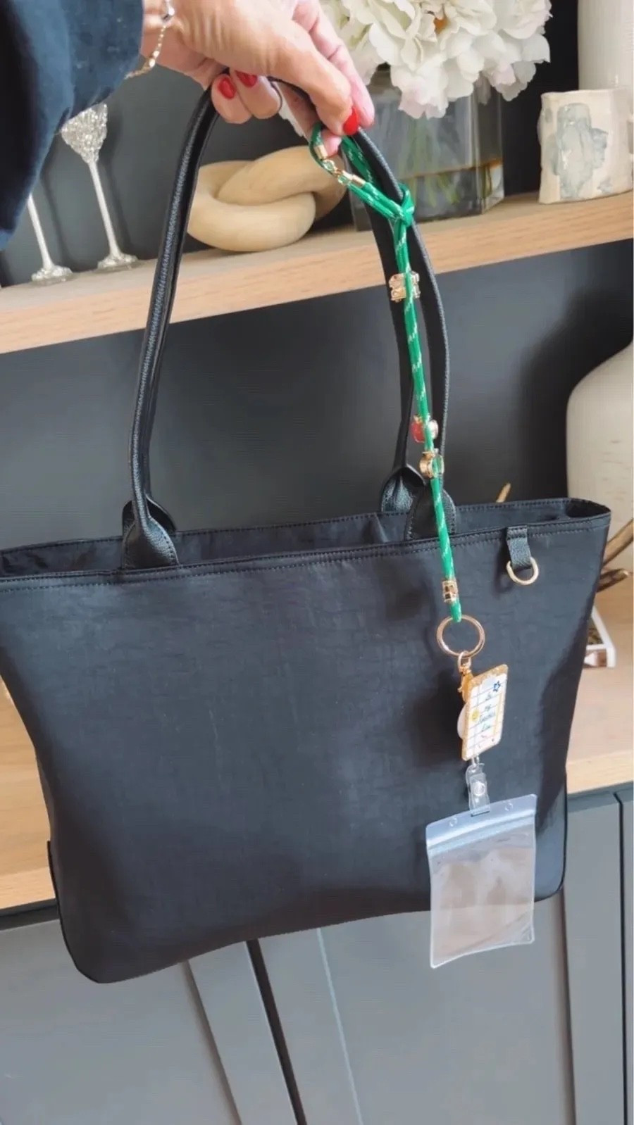 I wanted a work tote that looked polished but could still fit all of the everyday essentials, and this one checks every box. It’s lightweight, roomy enough for a laptop, planner, and water bottle, and the structured shape keeps it looking polished even when it’s full.

work tote, teacher bag, laptop bag, everyday tote, office essentials, commuter bag, workwear accessories, spacious handbag, black tote bag, teacher essentials, TheMomInStyle

#LTKWorkwear #LTKTravel #LTKootd