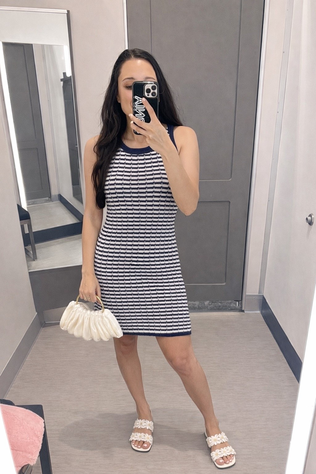 Navy blue and white striped midi is perfect with this shell inspired clutch! 

#LTKMidsize #LTKSeasonal #LTKdayinmylife