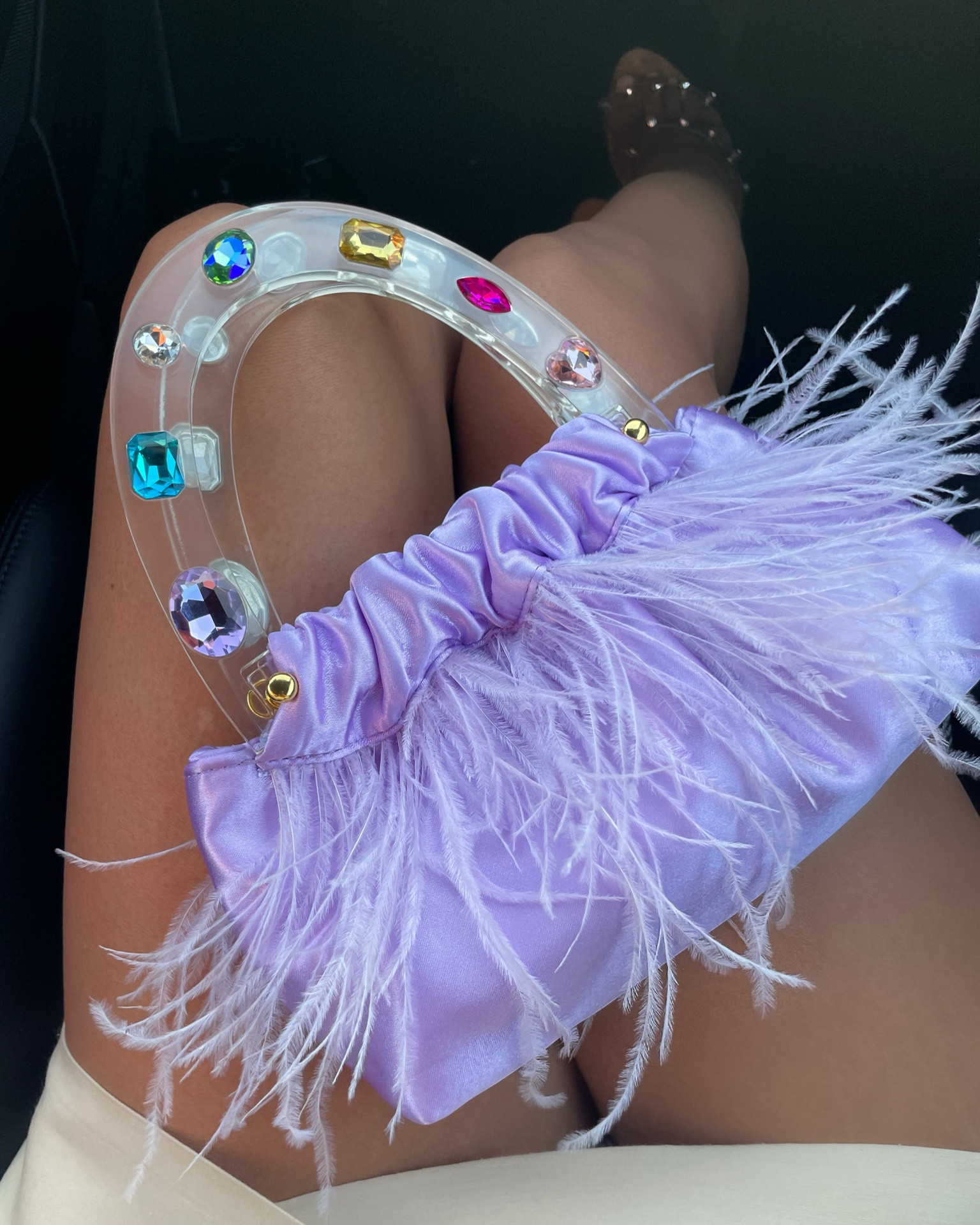 Playful feather fun, this clutch is large enough for your phone and fabulous essentials. An unexpected accessory that will liven up any outfit. Comes in this lavender purple, white, pink and a gorgeous green 

#LTKunder100 #LTKitbag #LTKwedding